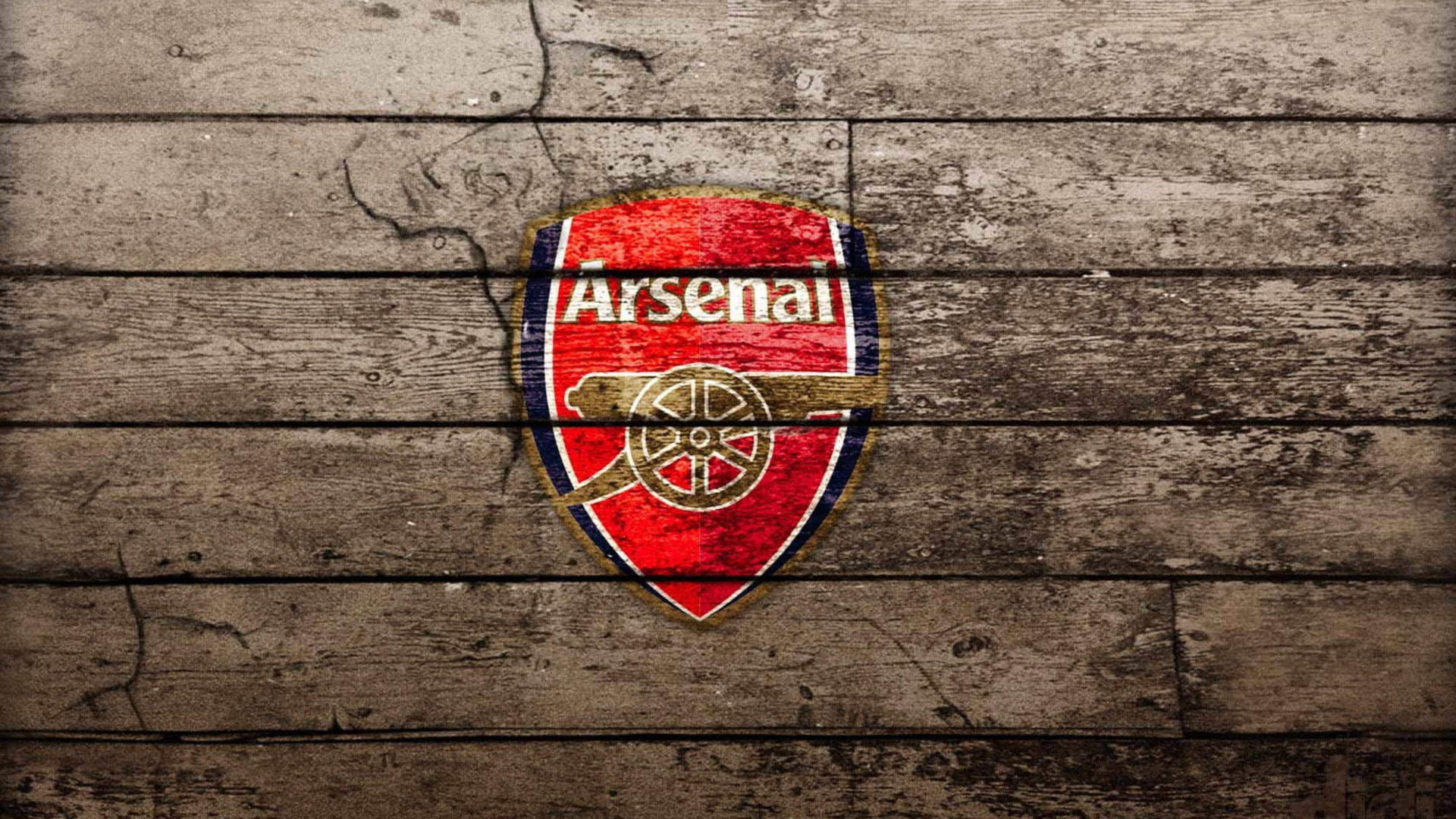 Arsenal Emblem On Wood Floor