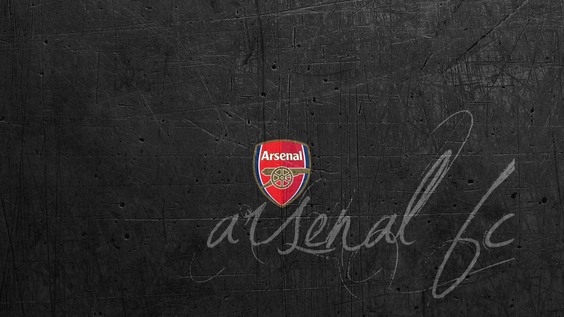 Arsenal Fc Logo On Gray Wall