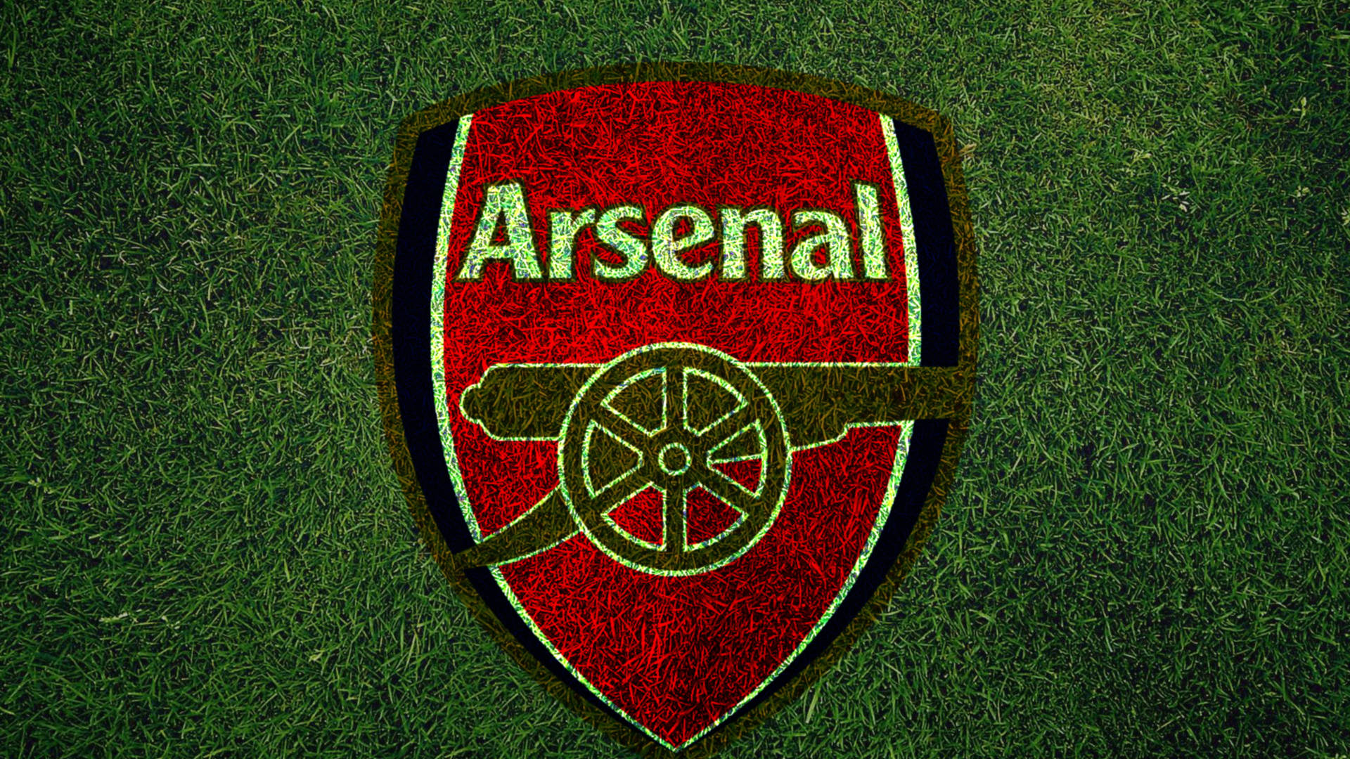 Arsenal Logo On Grass Field