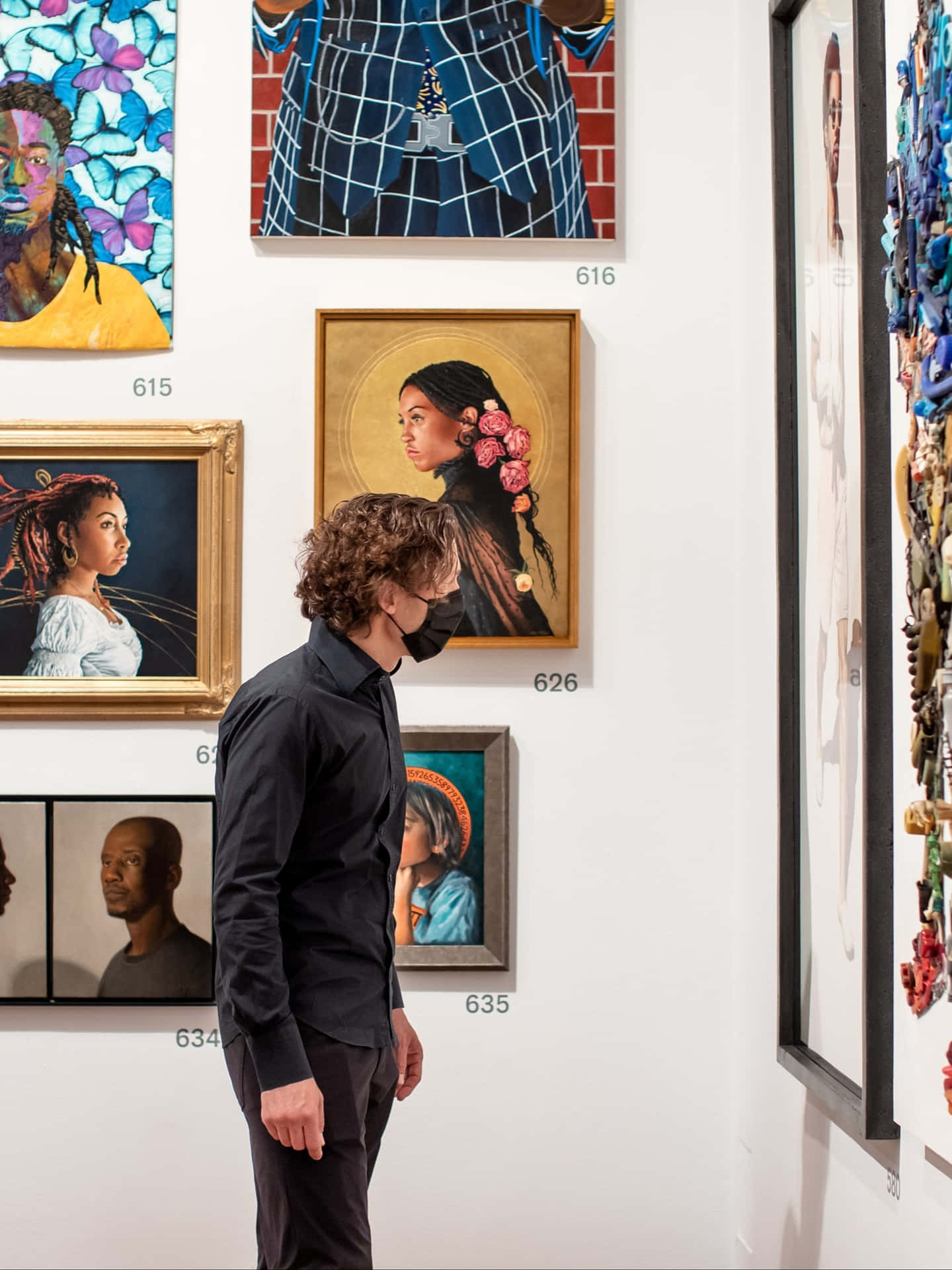 Art Exhibition Visitor Admiring Paintings Wallpaper