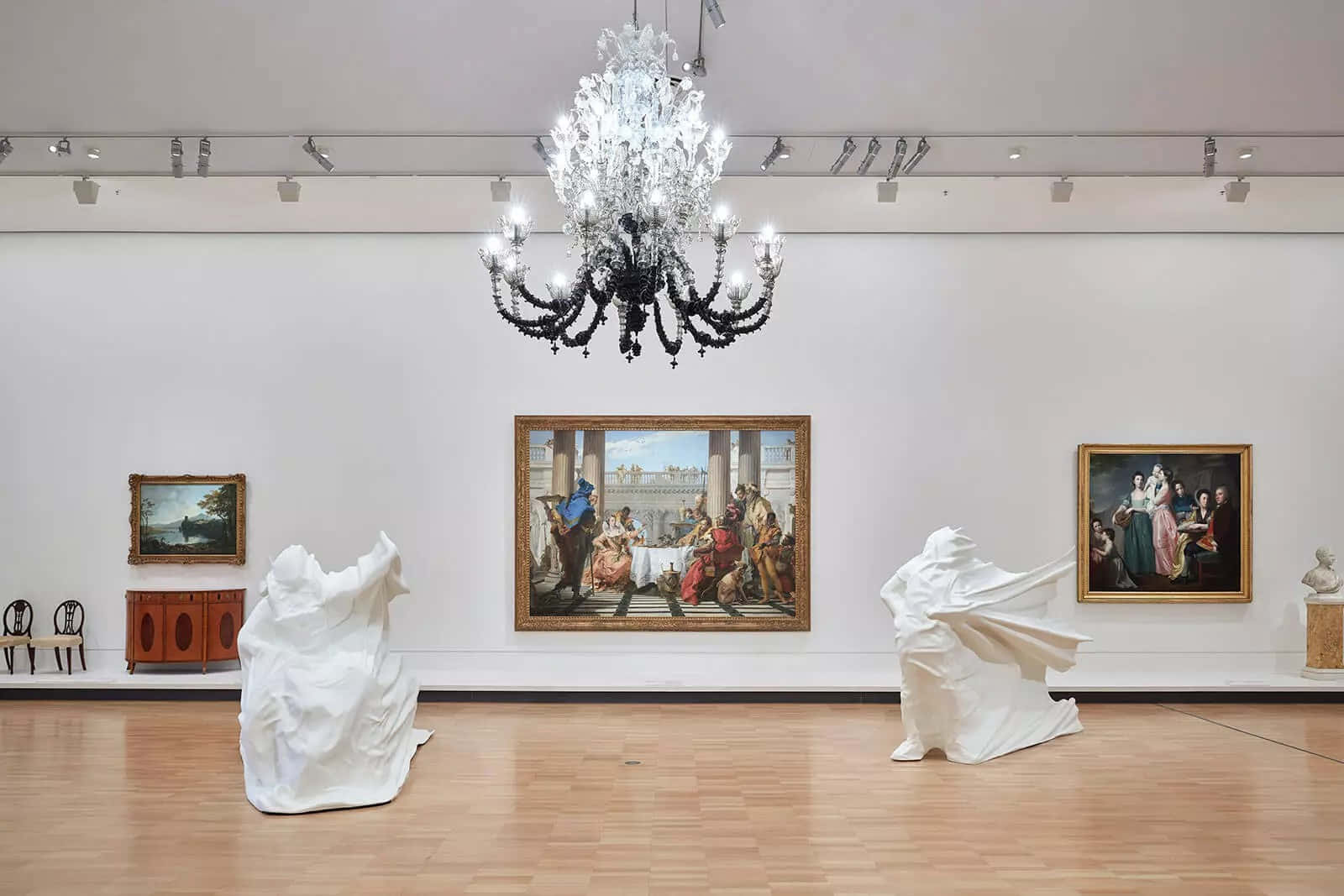 Art Gallery Interiorwith Paintingsand Sculptures Wallpaper