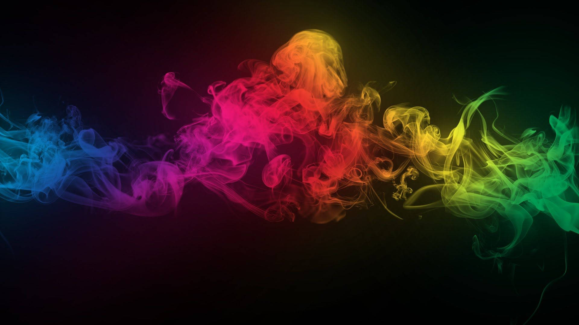Revel in the swirling beauty of colorful smoke Wallpaper