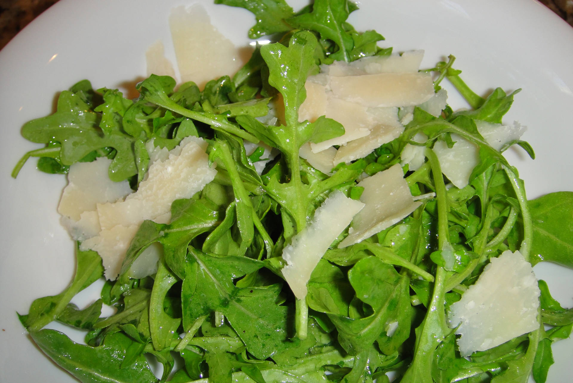 Arugula Leaves With Shaved Cheese Wallpaper