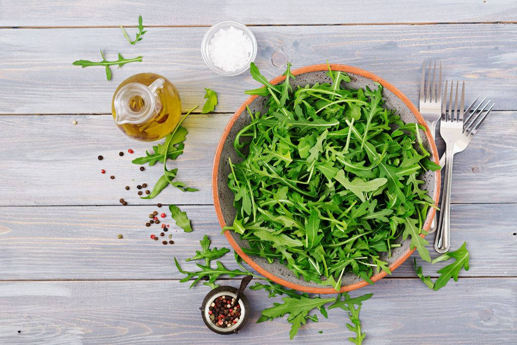 Arugula Salad With Olive Oil And Sauce Wallpaper