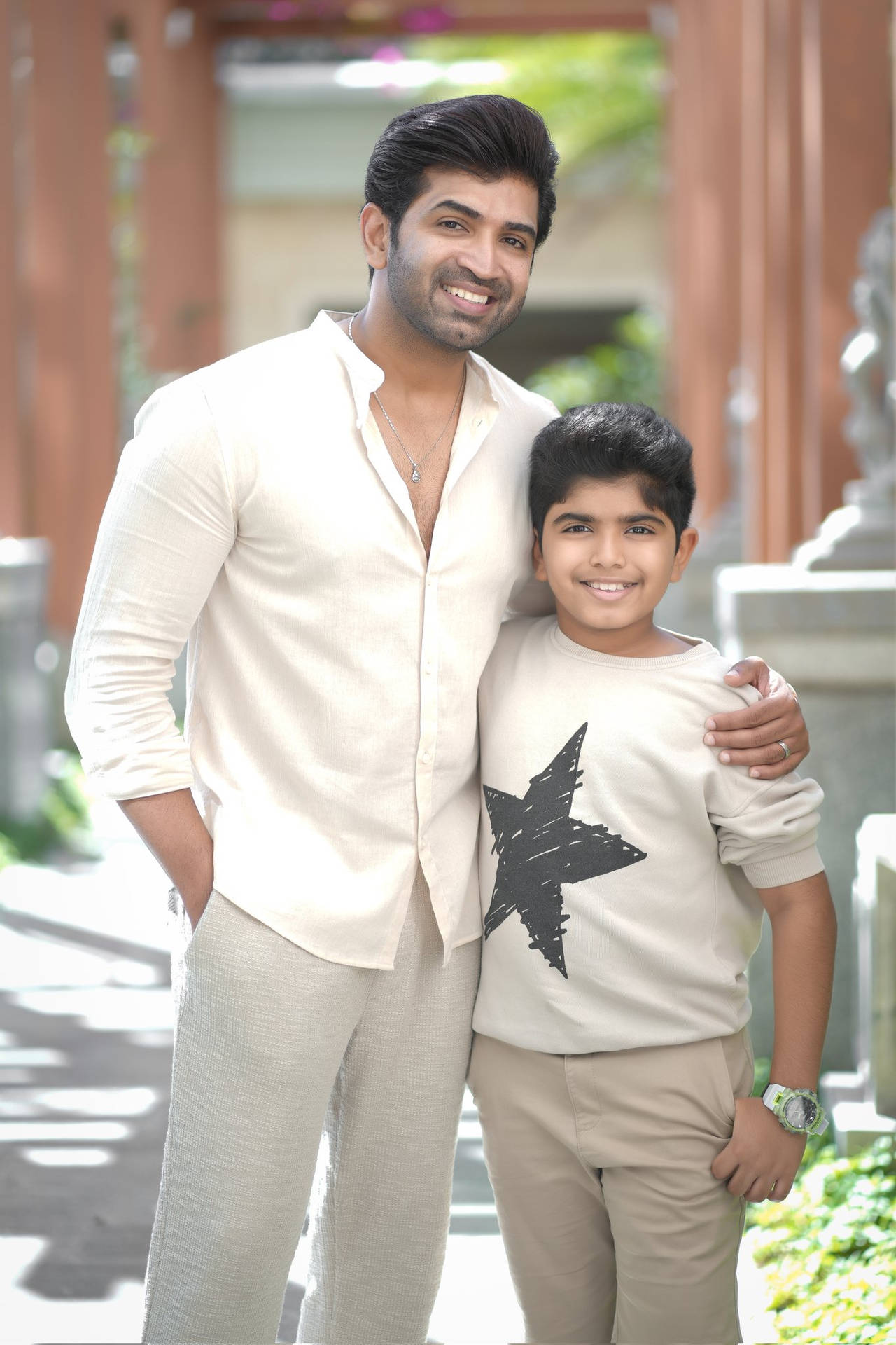 Arun Vijay With A Young Boy Wallpaper