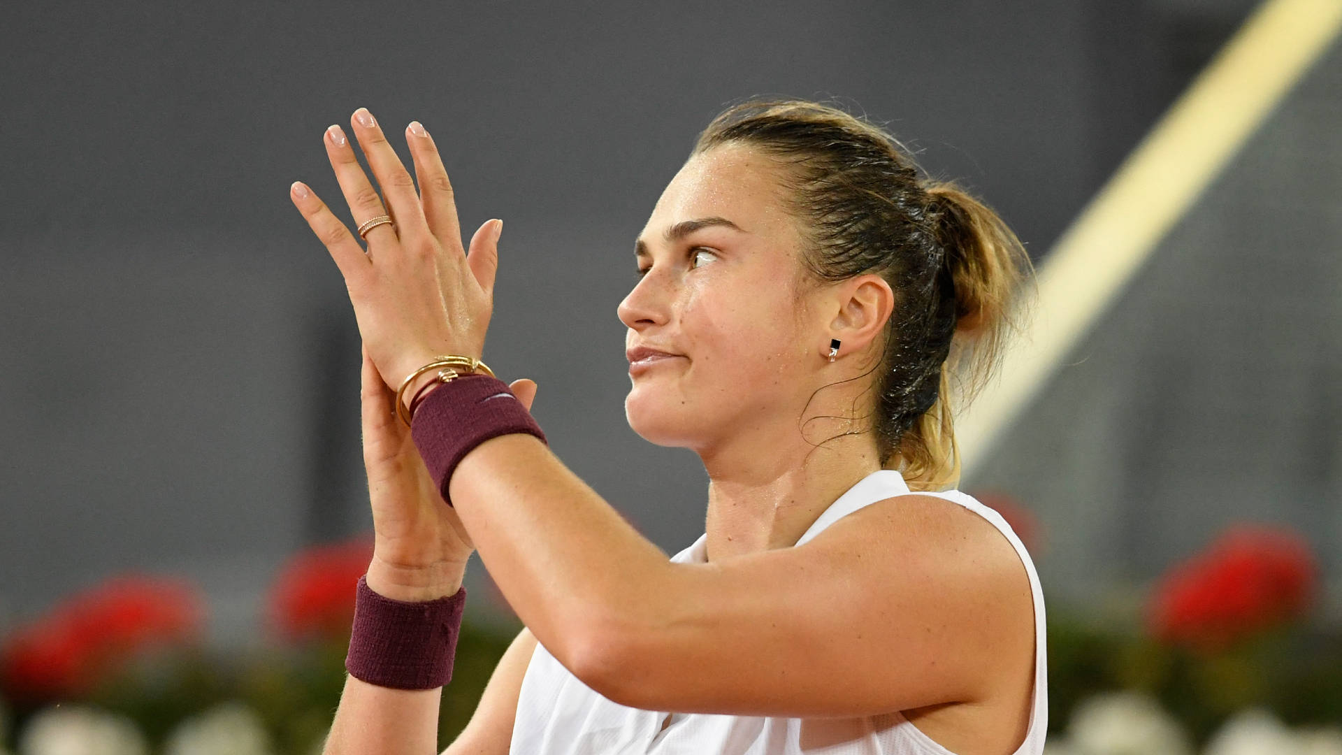 Aryna Sabalenka Appreciating Her Opponent with Applause. Wallpaper