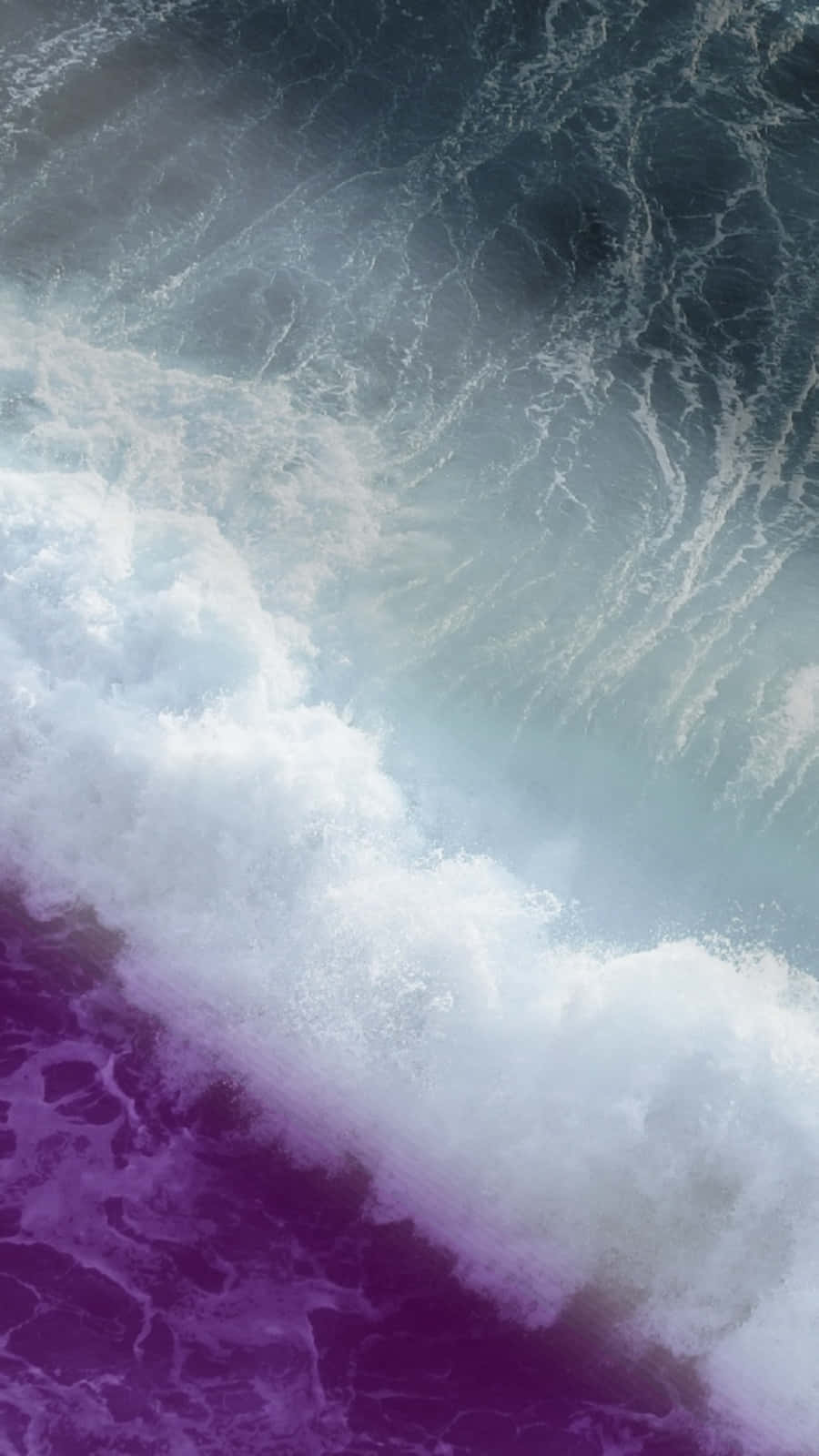 A Purple Wave Is Crashing Into The Ocean Wallpaper