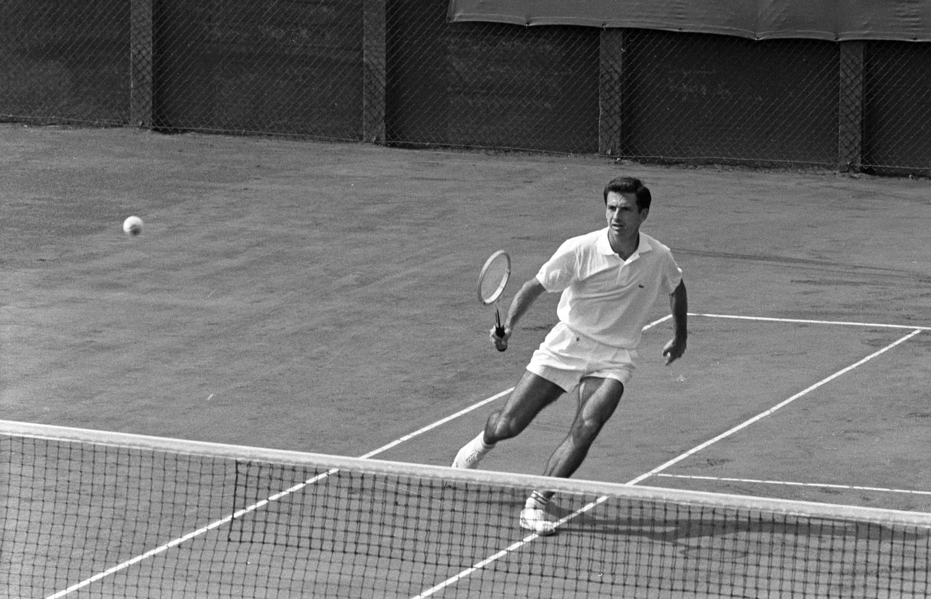 Ashley Cooper in action at the 1962 Dutch Professional Tennis Championships Wallpaper