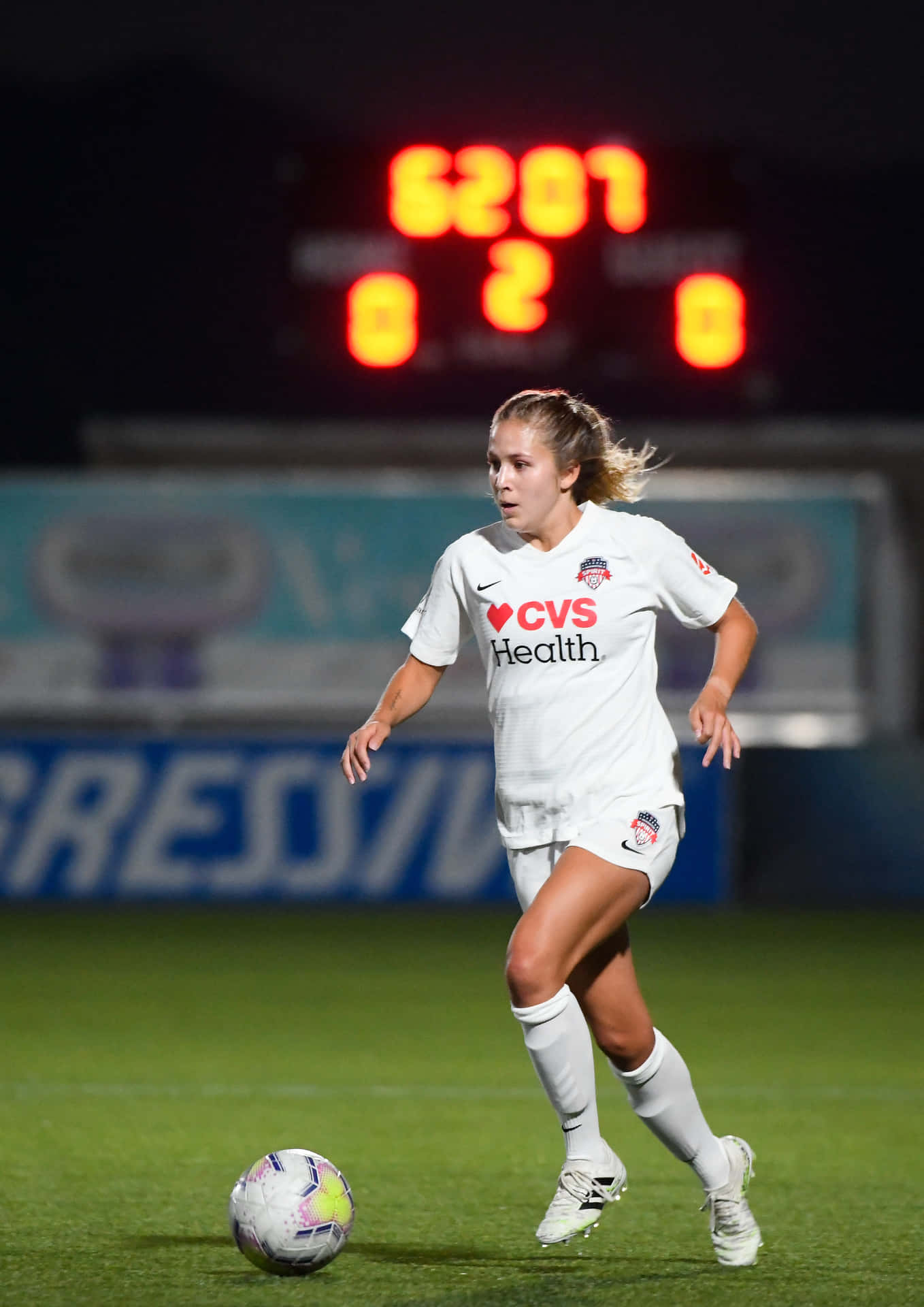 Ashley Sanchez Scoring A Goal During A Professional Soccer Match. Wallpaper