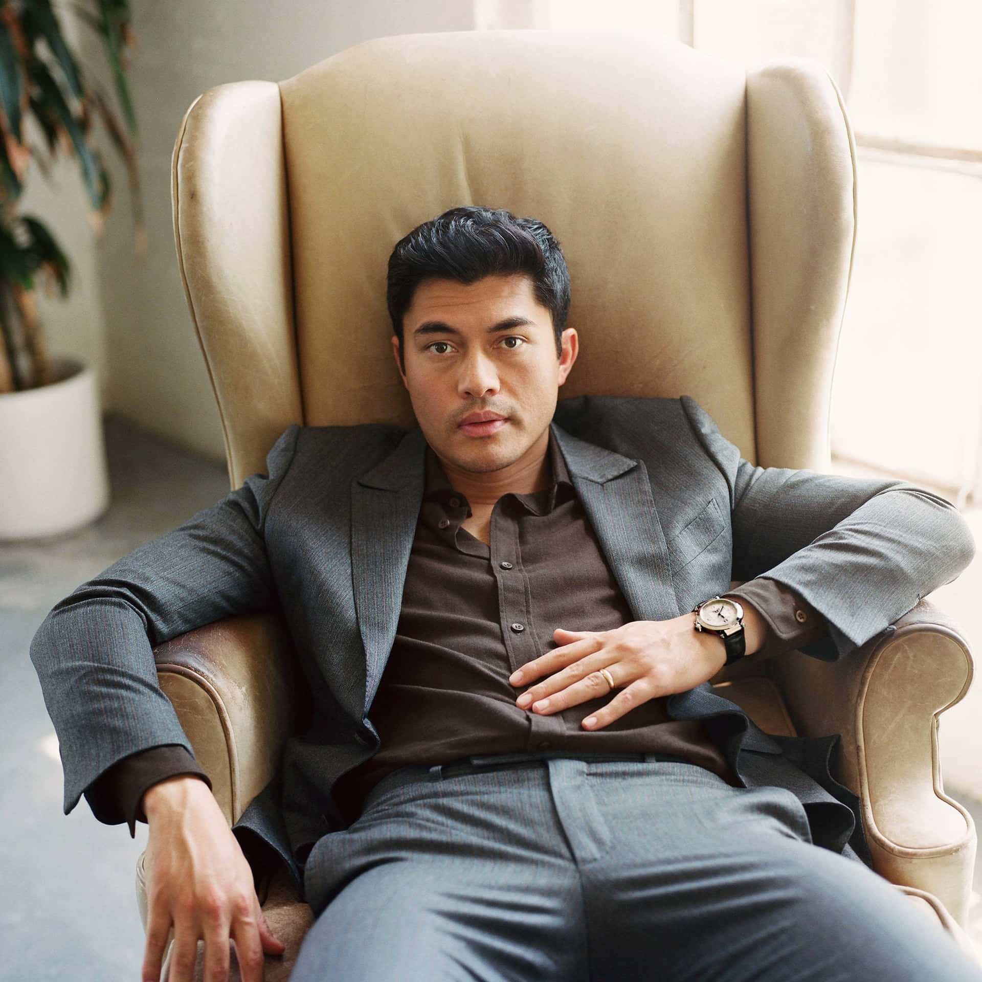 Asian Actor On The Chair Wallpaper