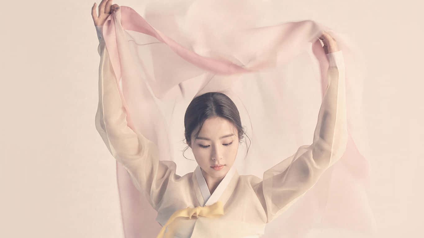 Caption: Beautiful Asian actress dons traditional Hanbok Wallpaper