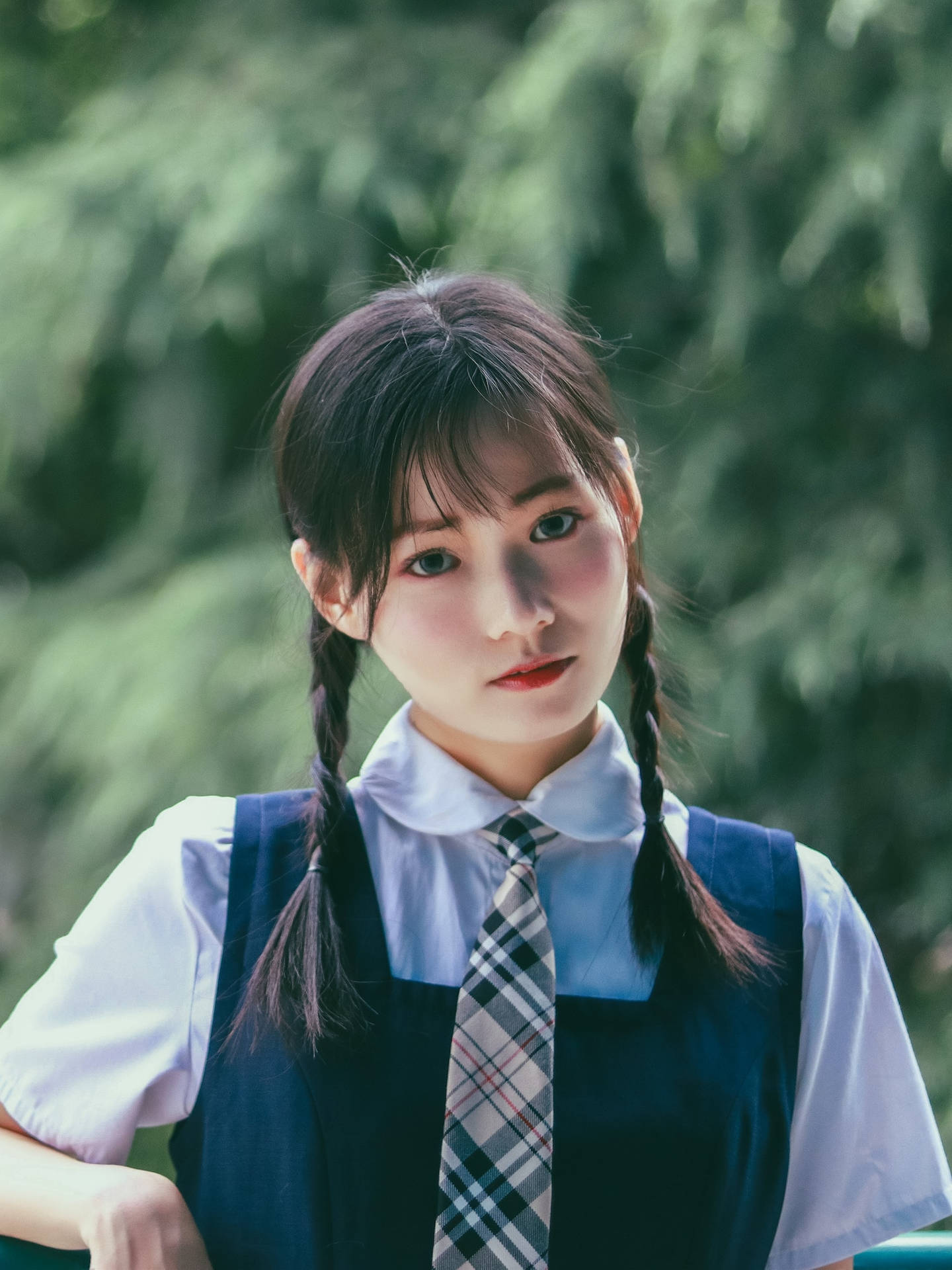 Asian Teenage Girl Student Wearing Uniform Wallpaper
