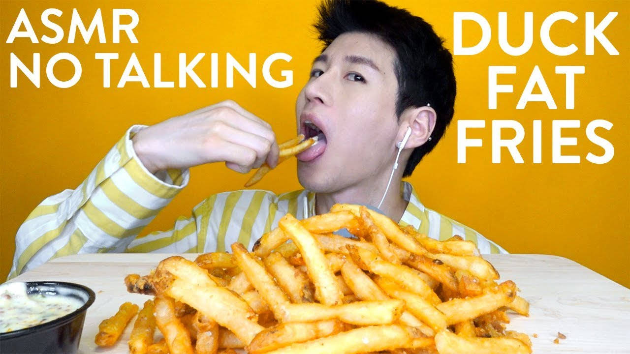 A Man Eating French Fries With The Words Asmr Duck No Talking Fat Fries Wallpaper