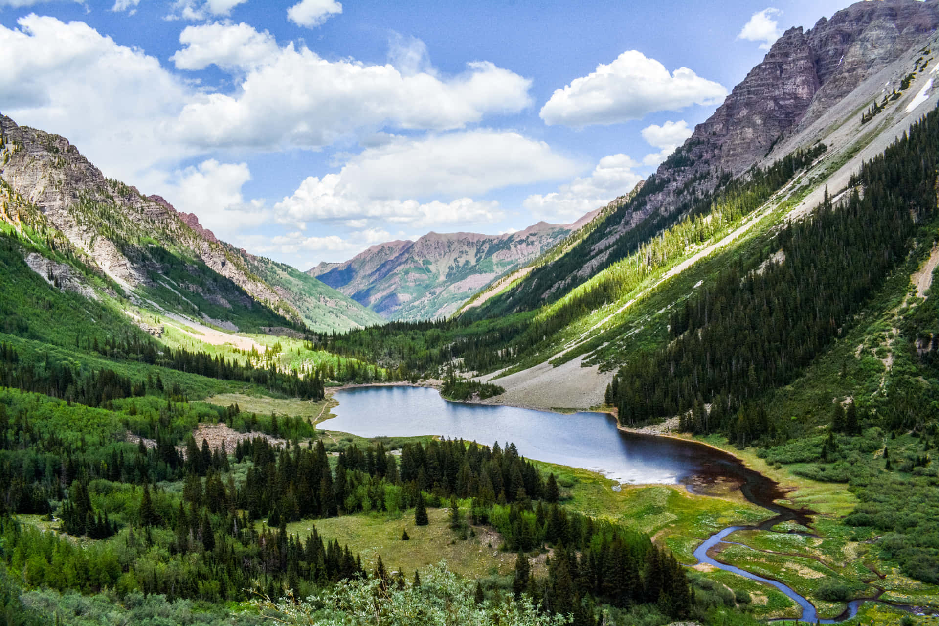 Enjoy the beauty of Aspen, Colorado with breathtaking views of the Rocky Mountains.
