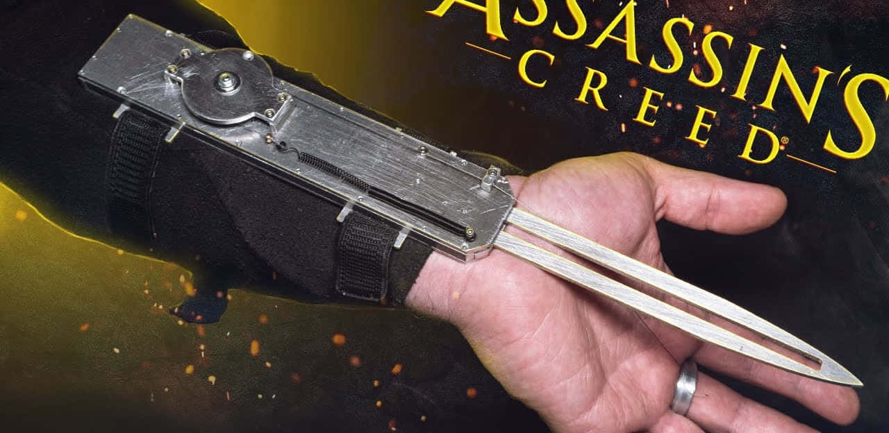 Assassin's Creed Warrior Showcasing Hidden Blades Wallpaper