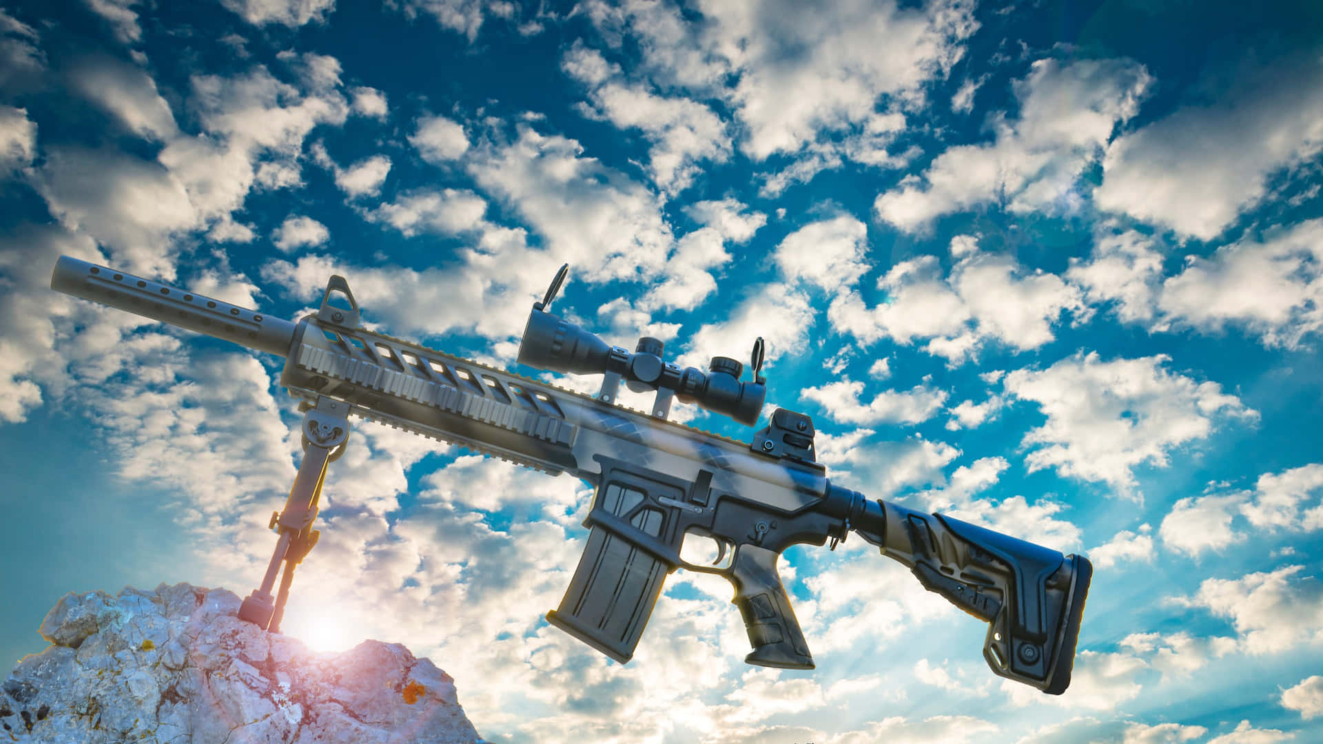 Assault Rifle Against Cloudy Sky Wallpaper