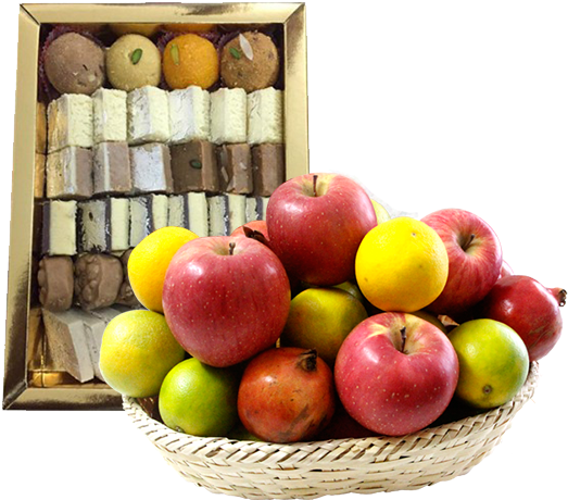 Assorted Applesand Pastries PNG — A woven basket overflowing with red yellow and green apples alongside a gold tray of assorted chocolates and dried fruits.