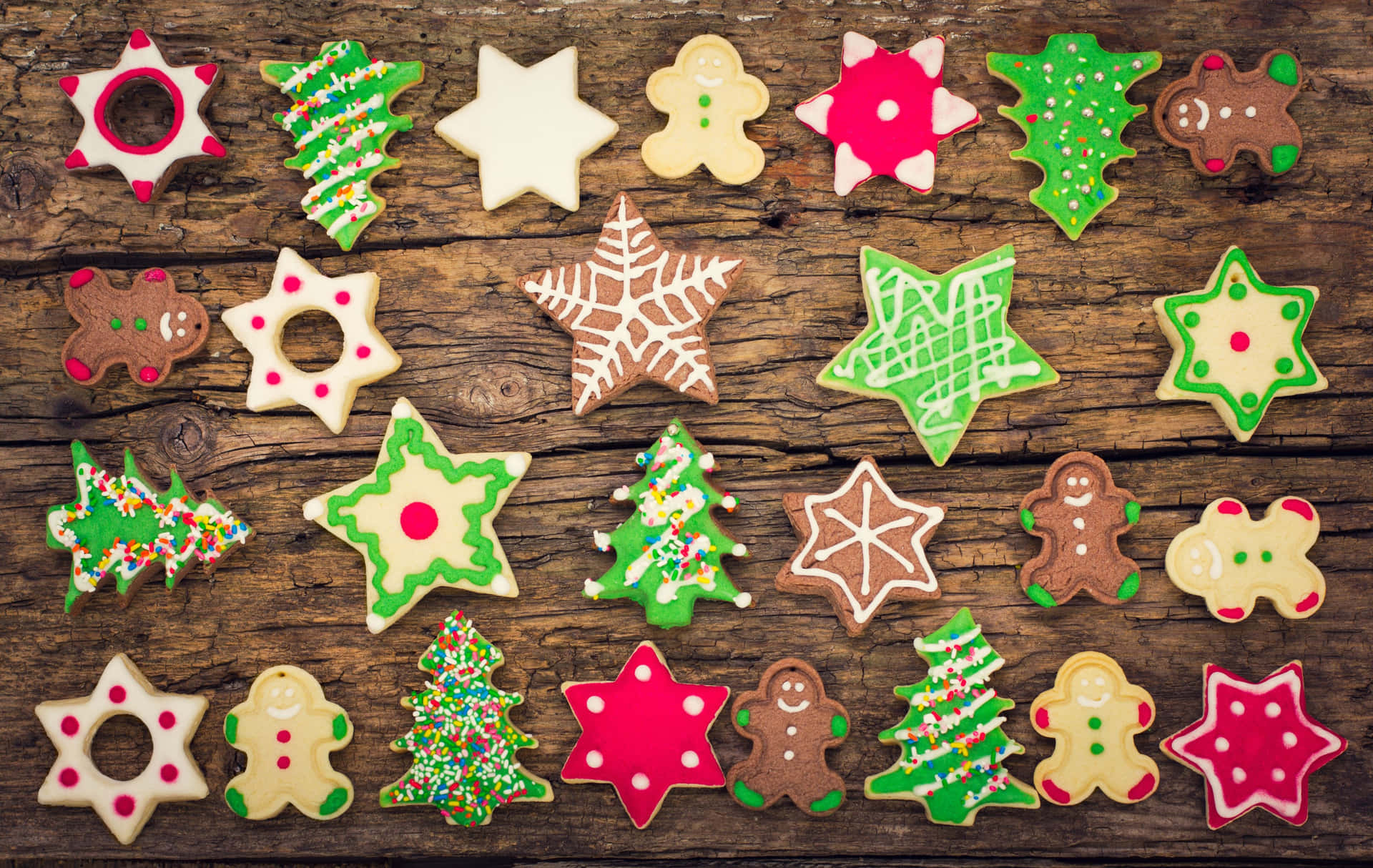 Assorted Christmas Cookies Wooden Background Wallpaper