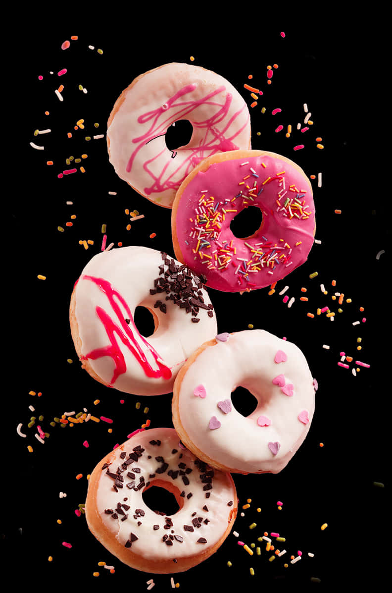 Assorted Donuts Fallingwith Sprinkles.jpg PNG