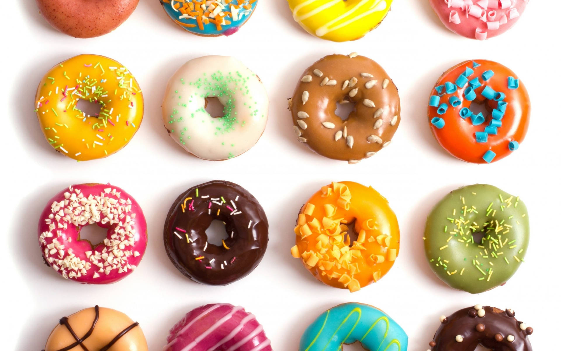 Assorted Donuts Top View Wallpaper