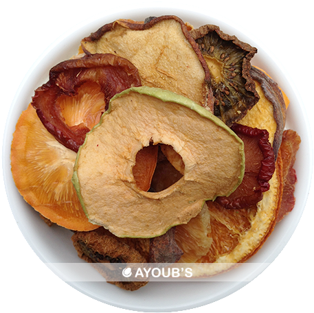 Assorted Dried Fruit Slices PNG — A top-down view of a white bowl filled with assorted dried fruit slices including apple orange and plum.