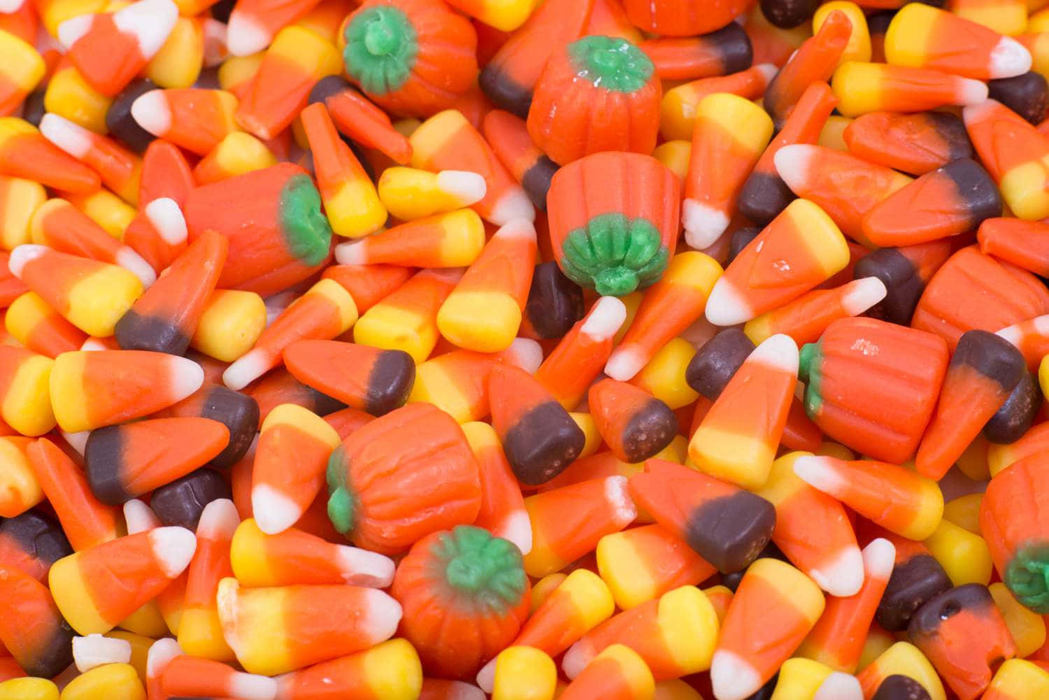 Assorted Halloween Candy Cornand Pumpkins Wallpaper