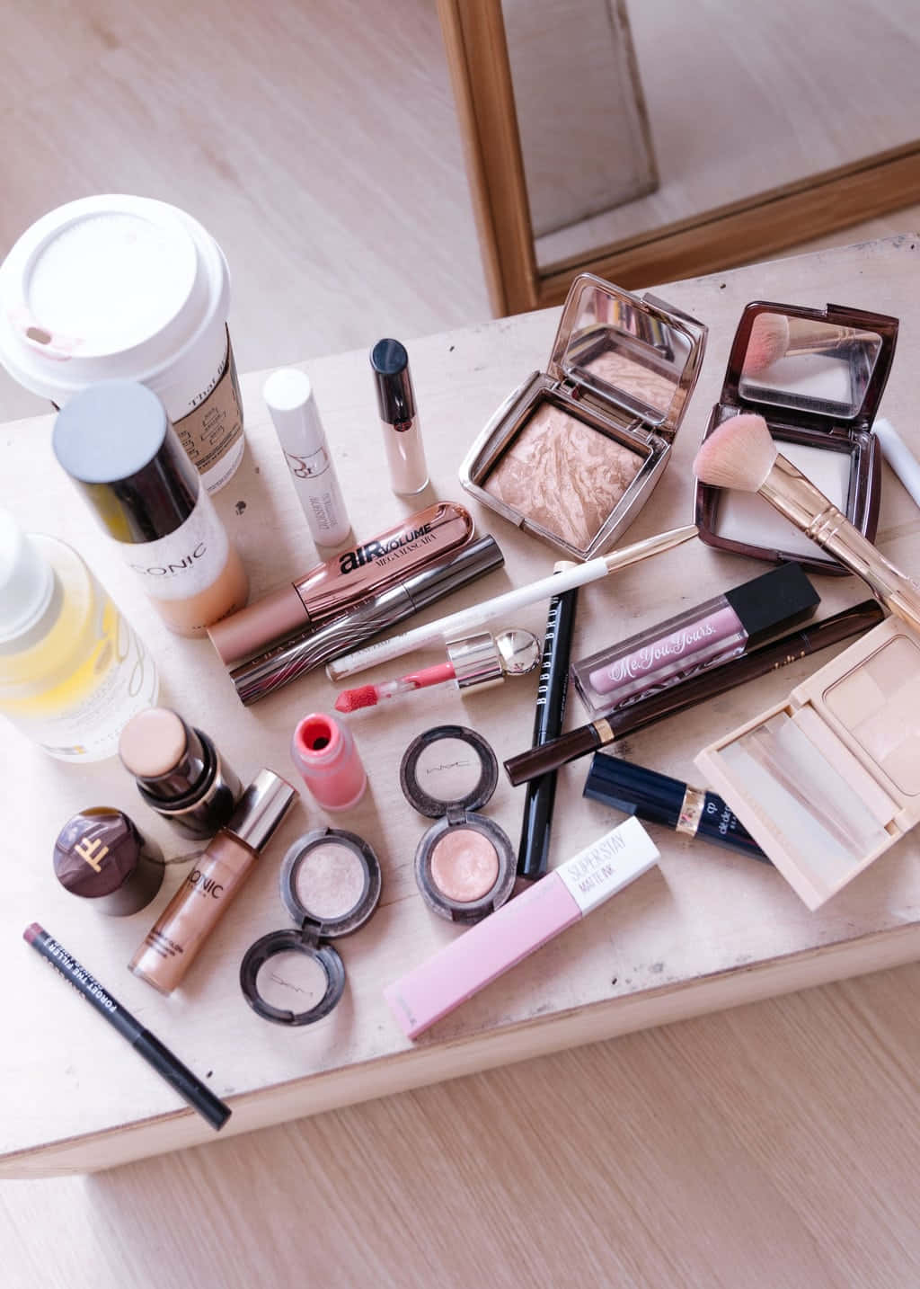 Assorted Makeup Productson Table Wallpaper