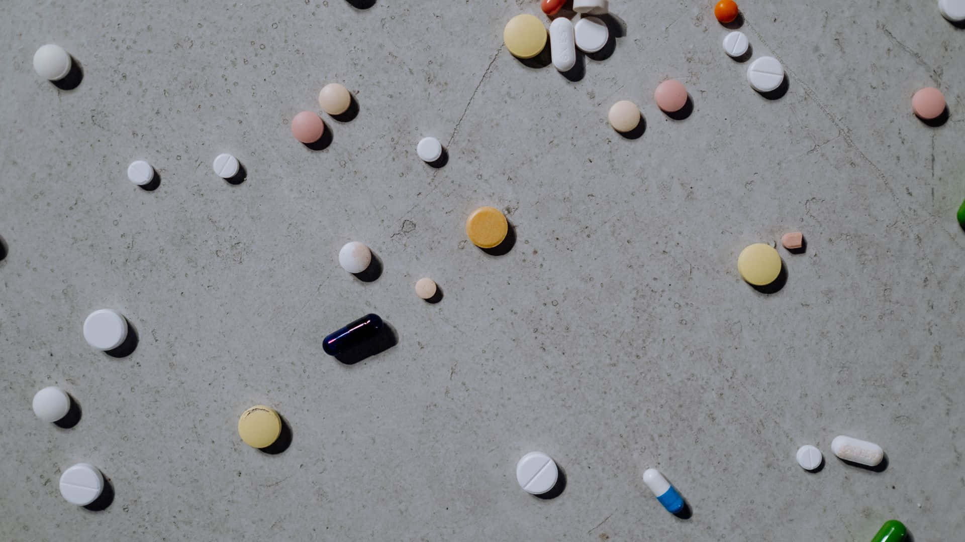 Assorted Medications Scattered Background Wallpaper