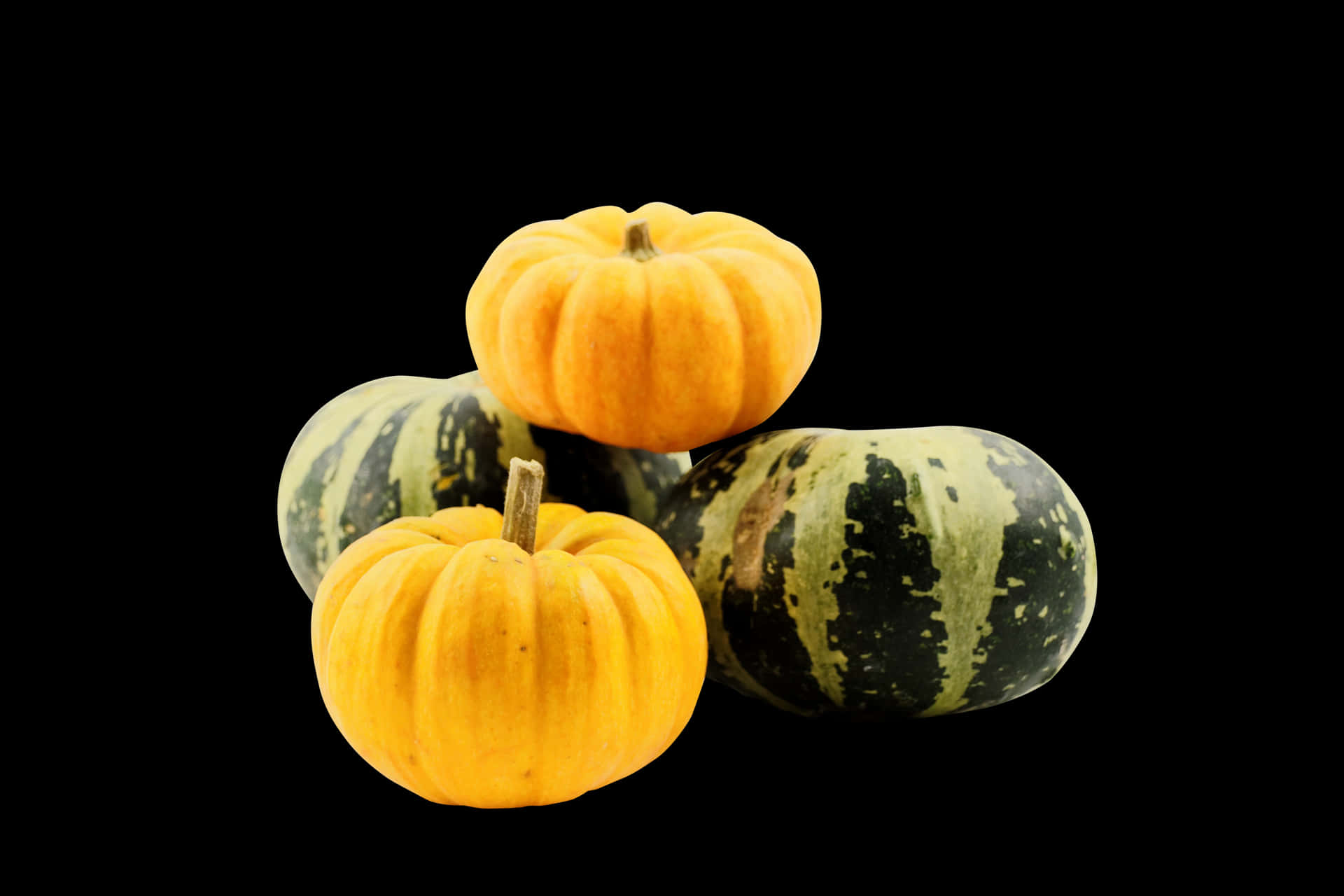 Assorted Mini Pumpkinson Black Background PNG