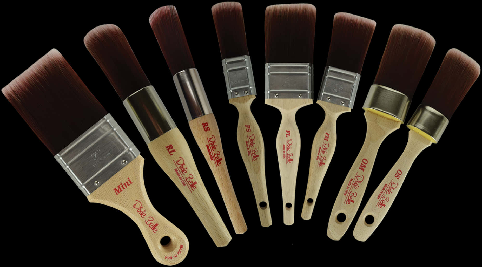 Assorted_ Paintbrushes_on_ Black_ Background.jpg PNG