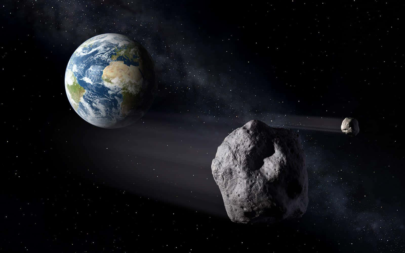 Space Dangers: Approaching Asteroid Wallpaper