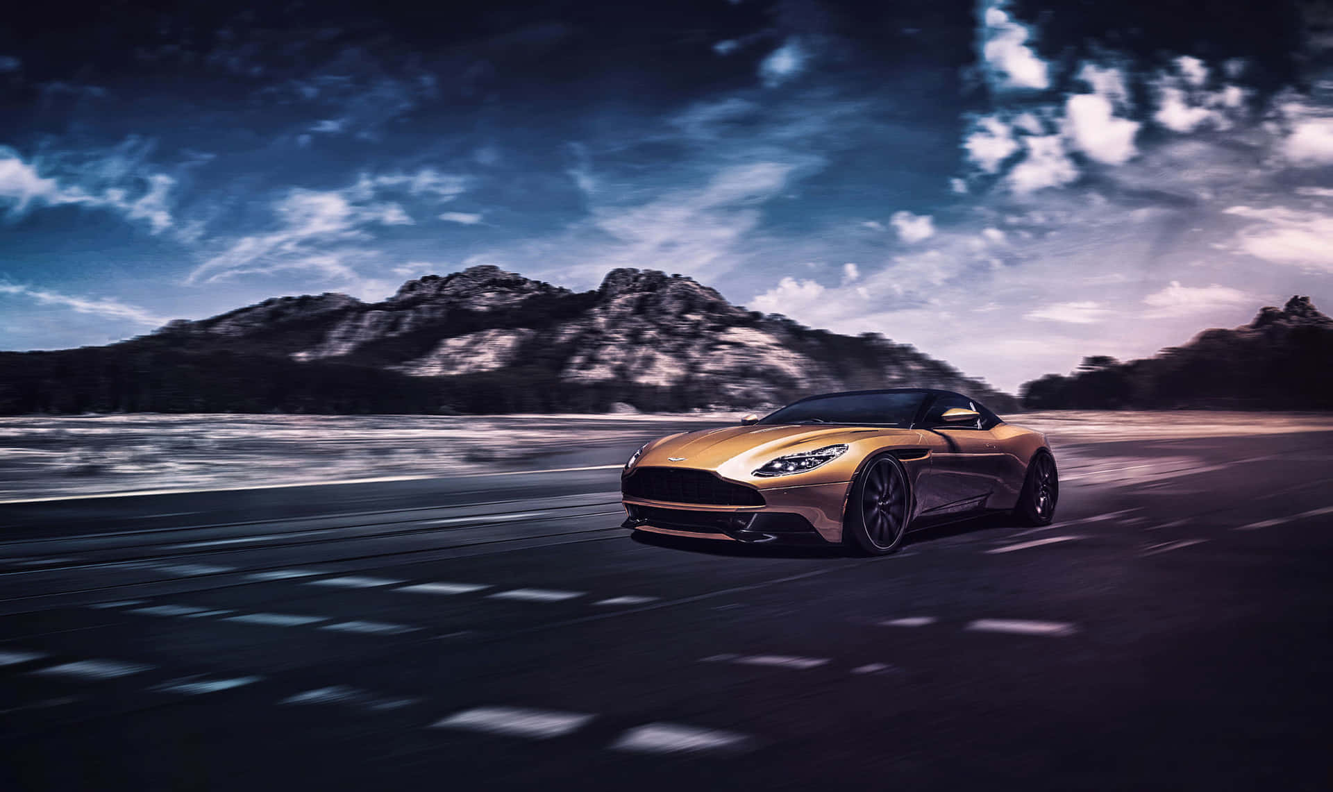 Impresionanteaston Martin Db11 En Movimiento Fondo de pantalla