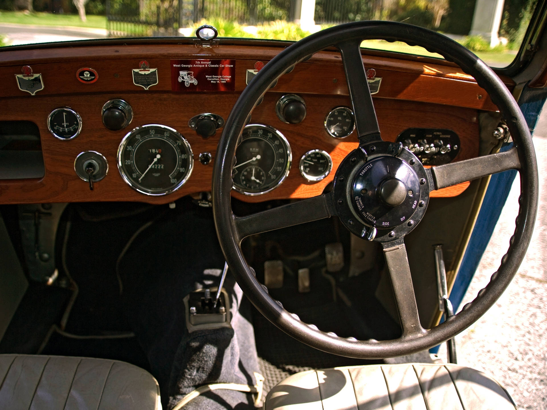 View of the Steering Wheel and Speedometer in a 1934 Aston Martin MKII Wallpaper