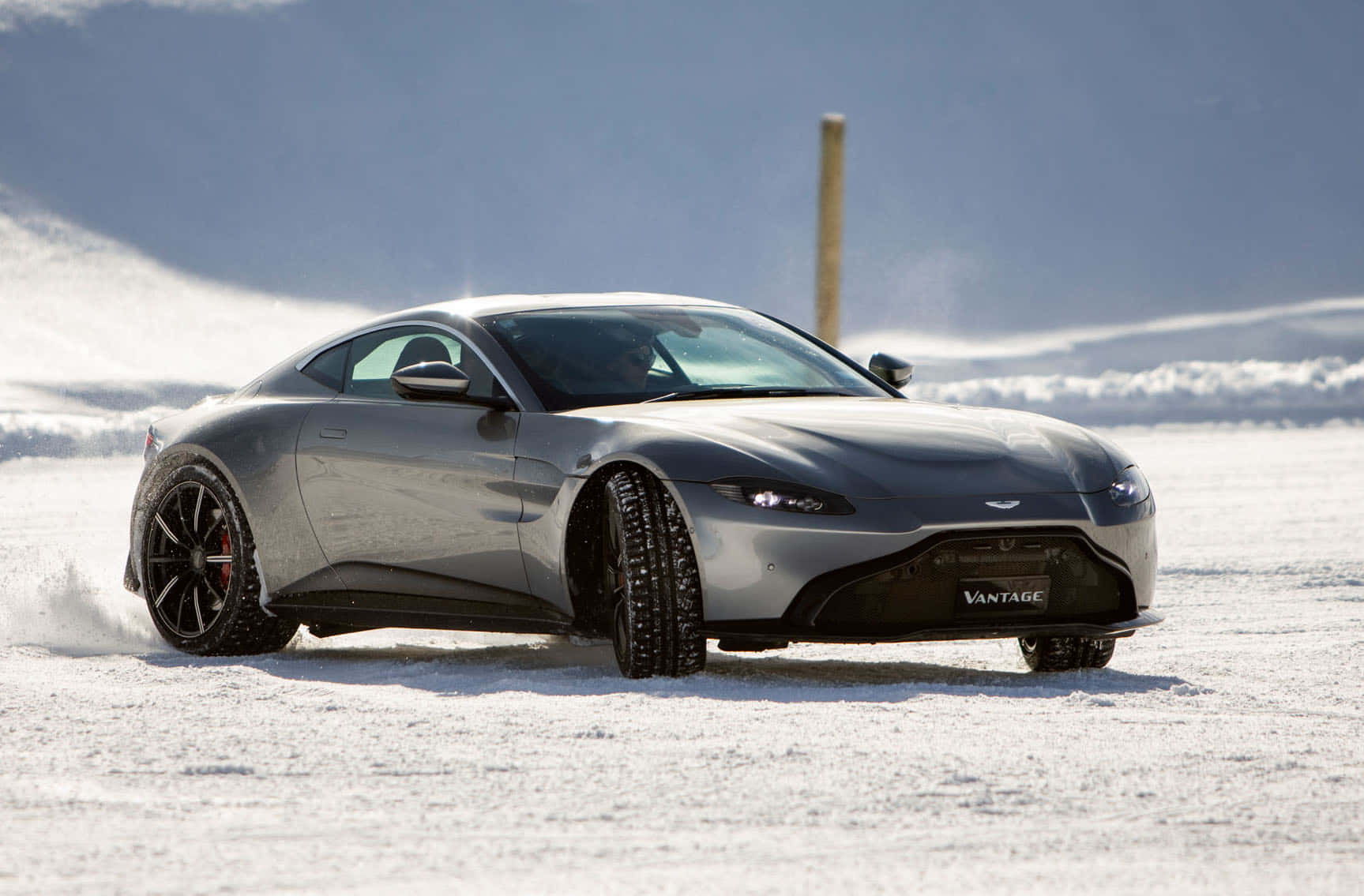 Aston Martin Vantage Gt Driving On Snow