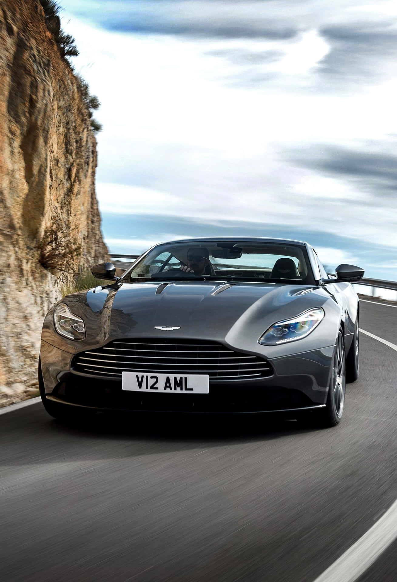 Aston Martin Rapide S in motion on a thrilling drive Wallpaper