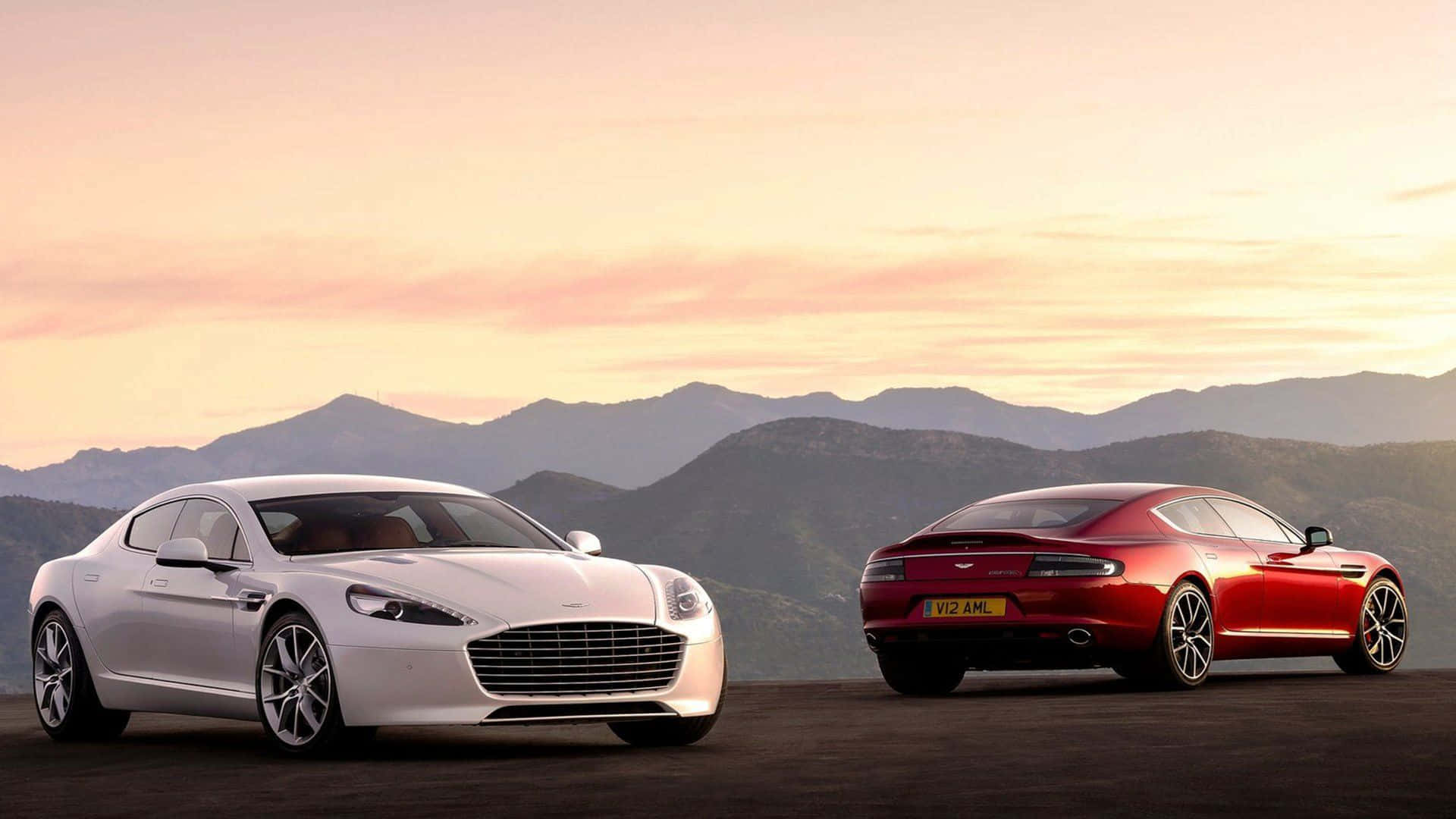 Luxury Redefined: Aston Martin Rapide S in Motion Wallpaper