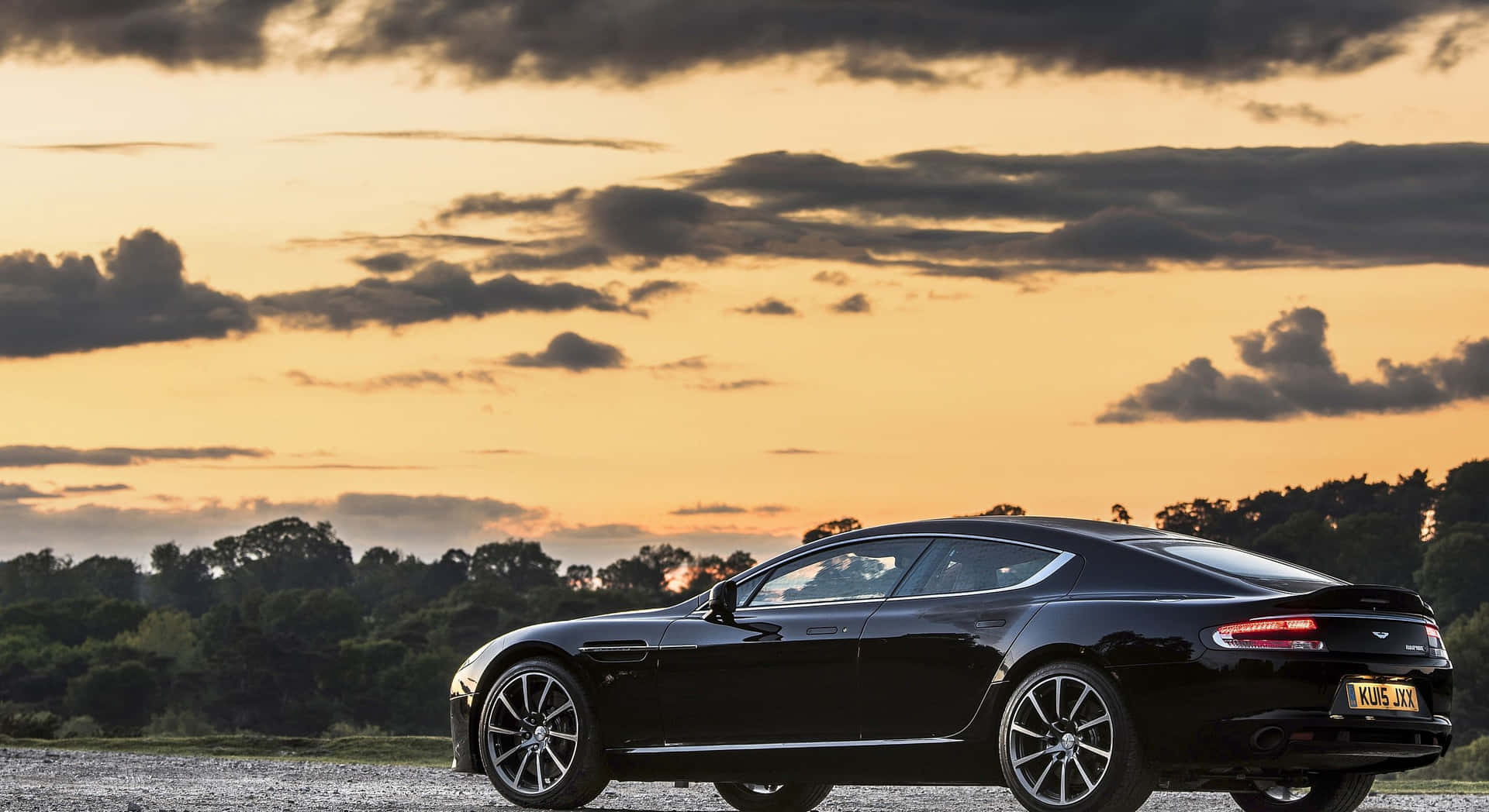 Elegant Aston Martin Rapide S in Motion Wallpaper
