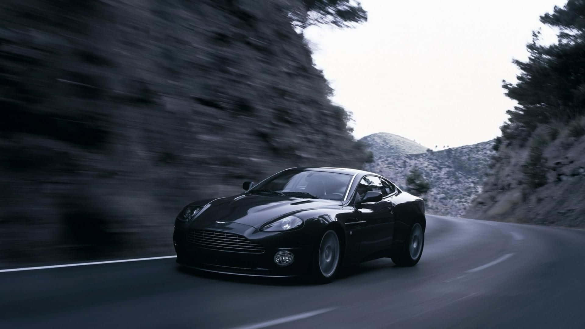 Caption: Aston Martin V12 Vantage 2021 Edition: Luxury Meets Power. Wallpaper