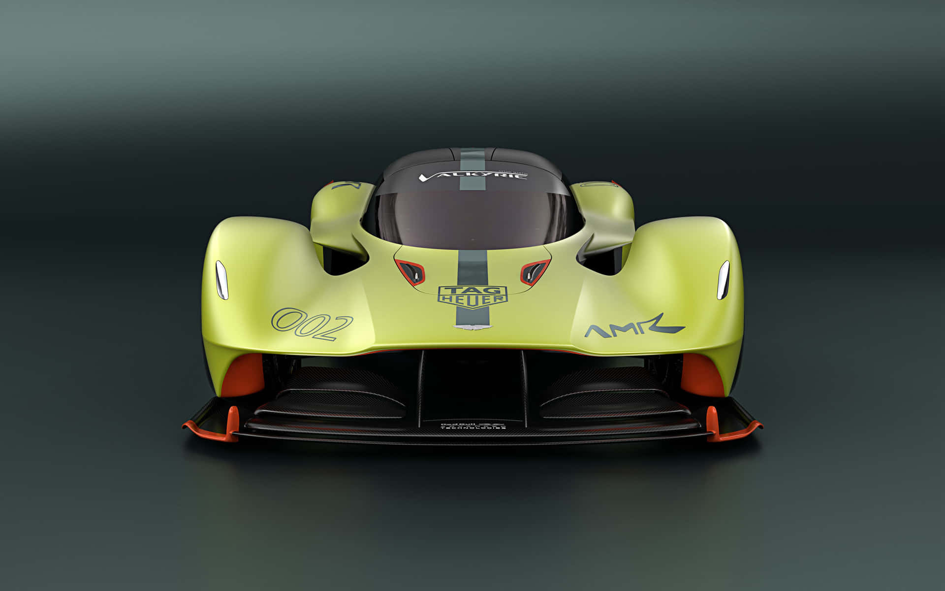 Aston Martin Valkyrie racing on the track Wallpaper