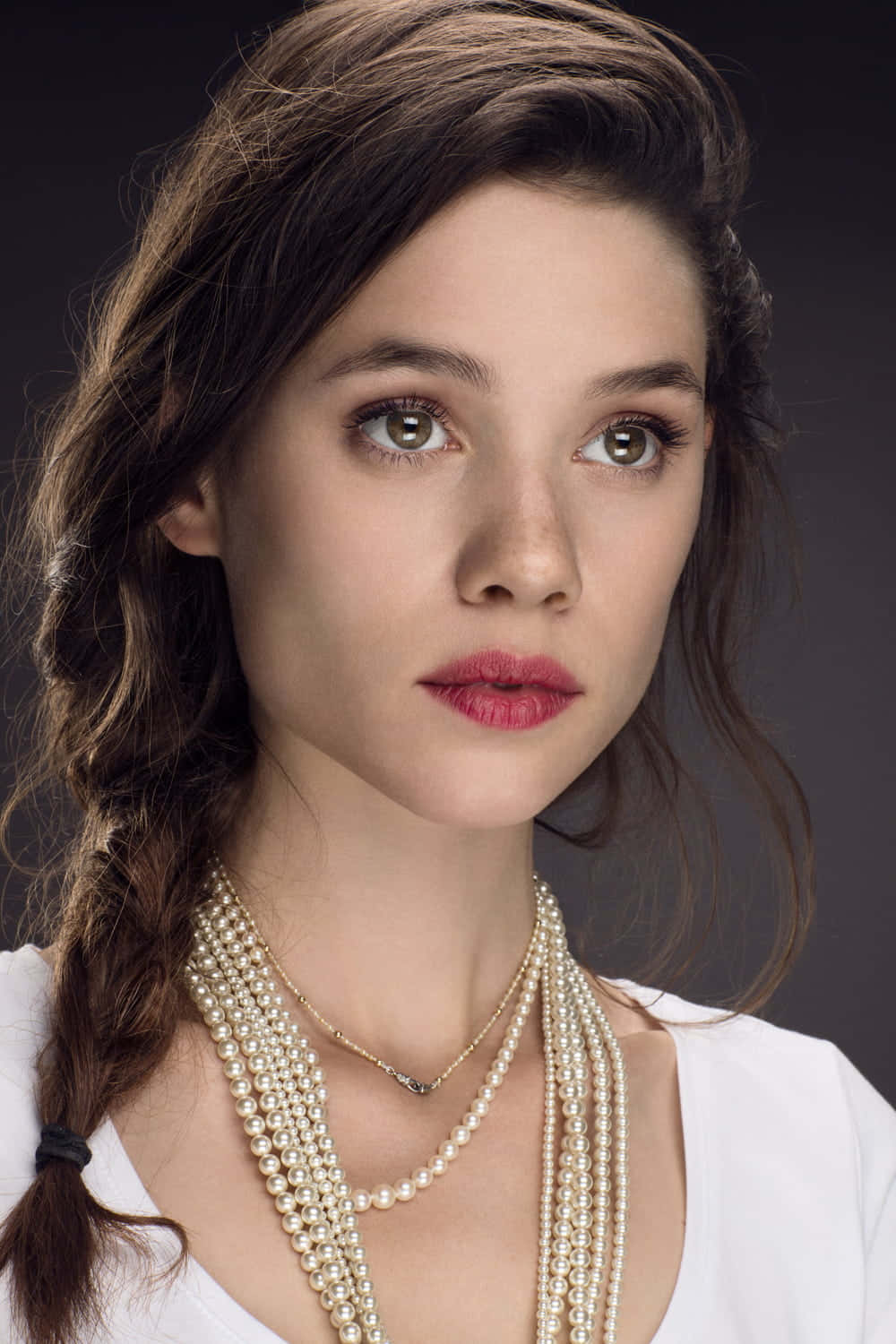 Astrid Berges-Frisbey posing elegantly at a photoshoot. Wallpaper