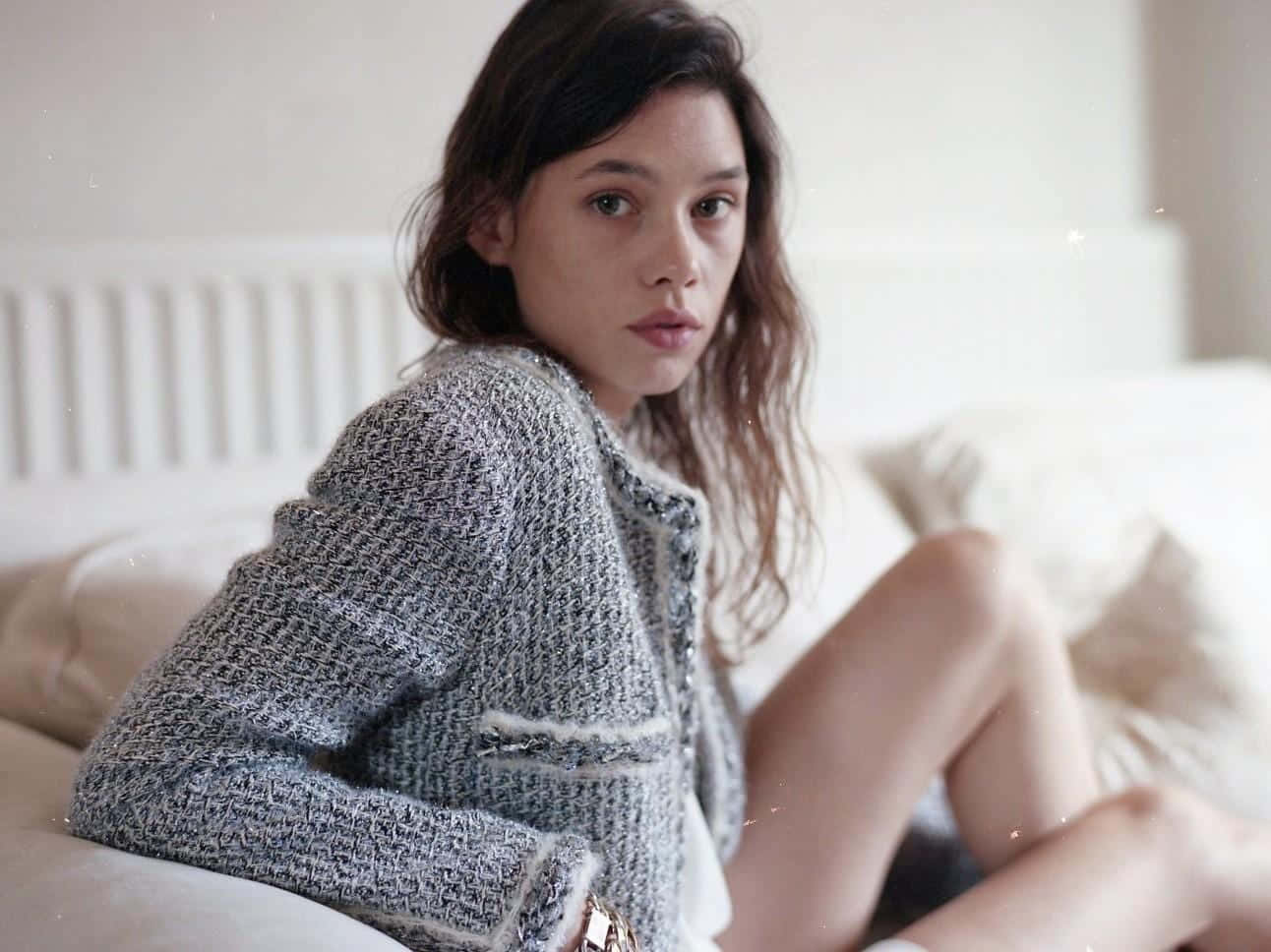 Astrid Berges-Frisbey posing for a portrait Wallpaper