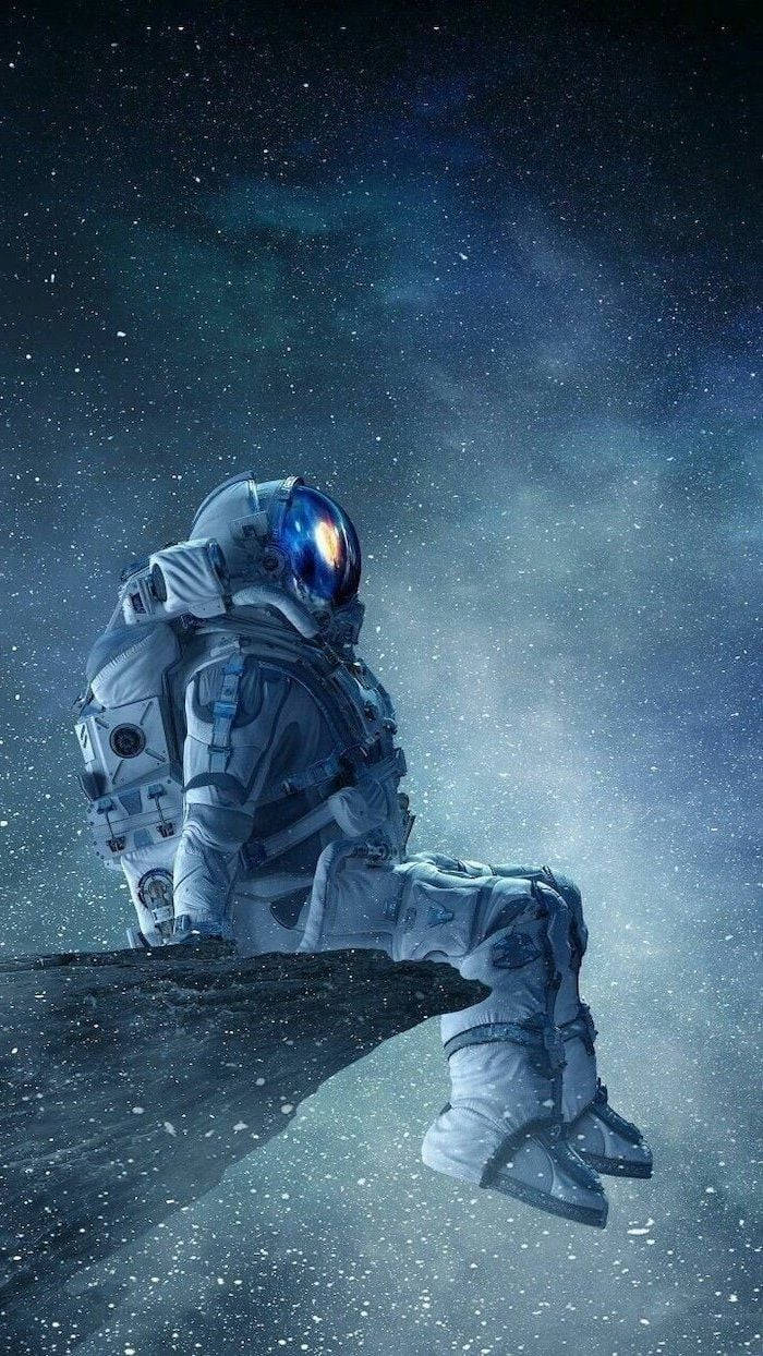 Astronaut Aesthetic Seating On Edge Wallpaper