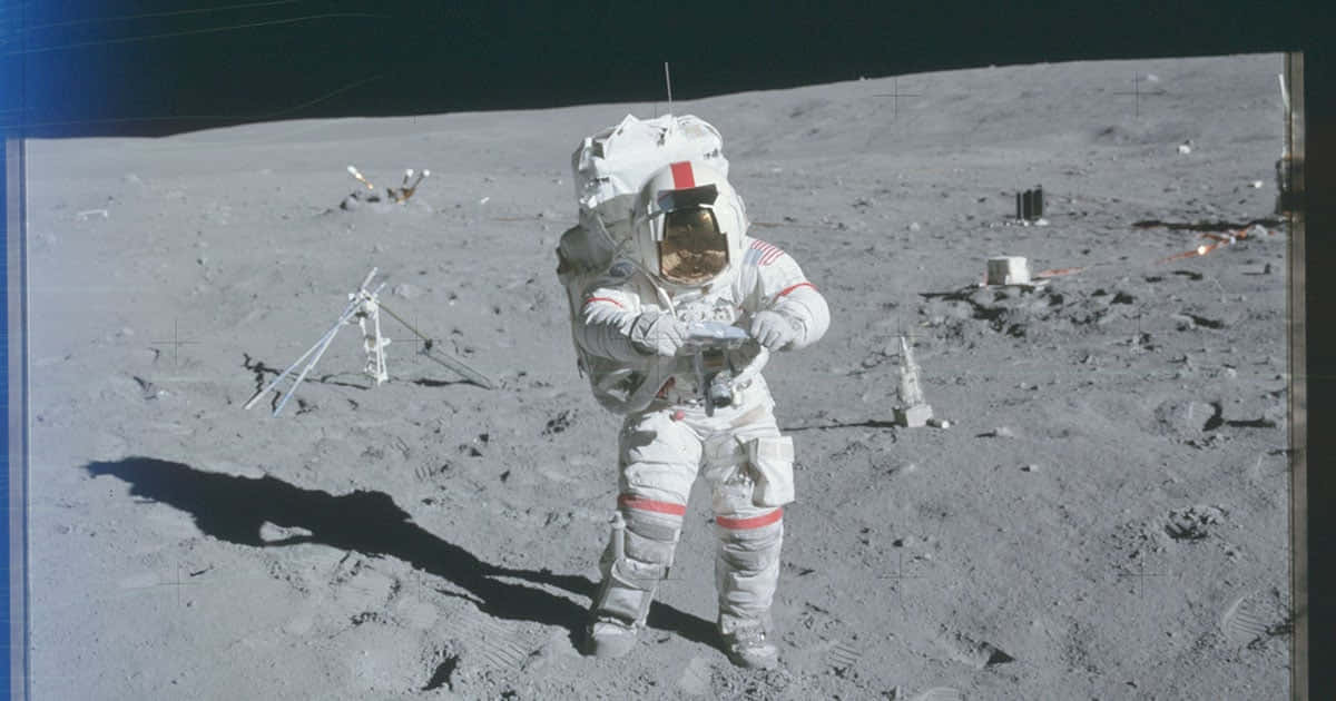 Astronaut Exploring The Lunar Surface Wallpaper