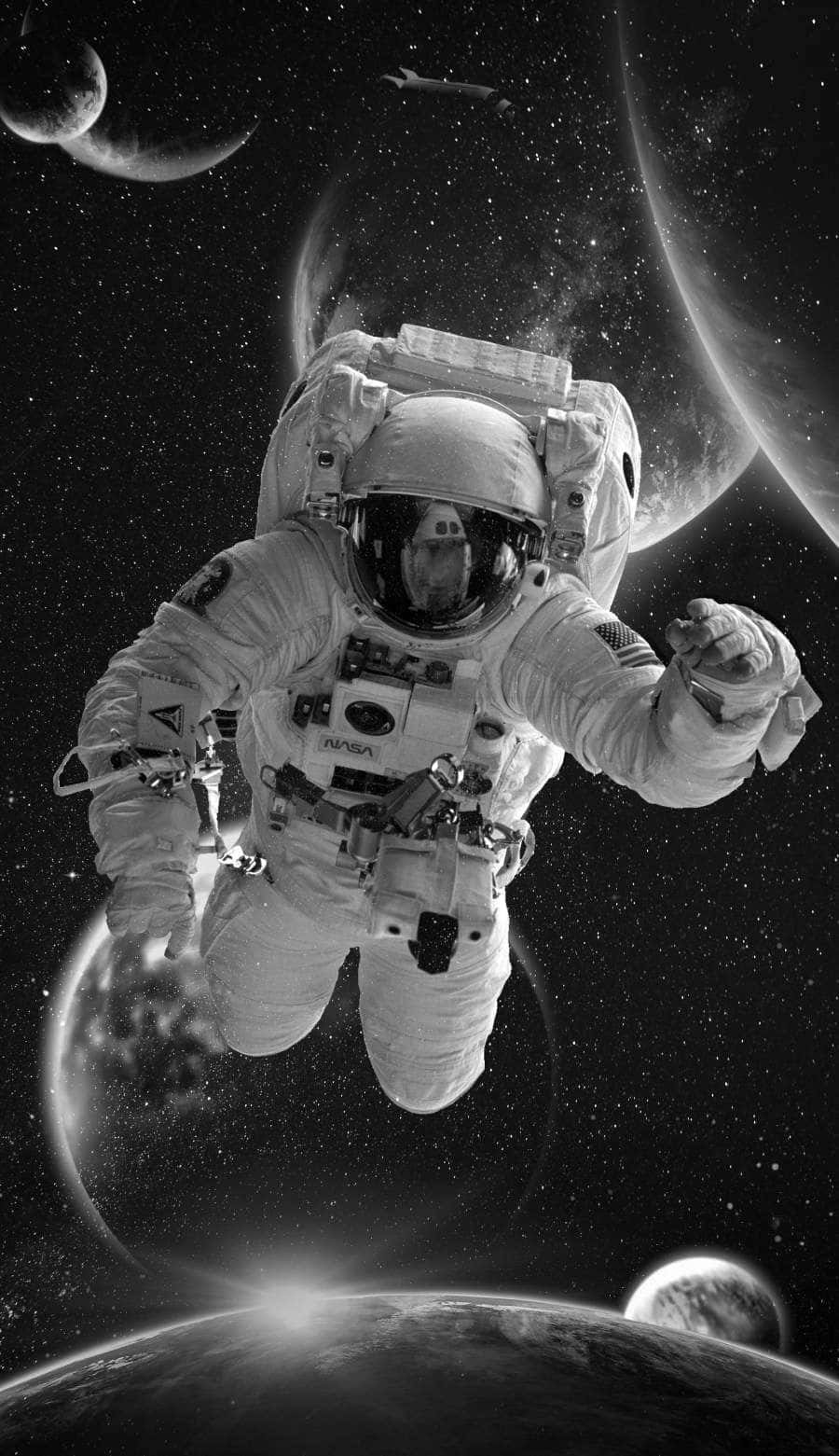 En fremtidig astronaut og hans iPhone XS udforsker en fjern galakse. Wallpaper