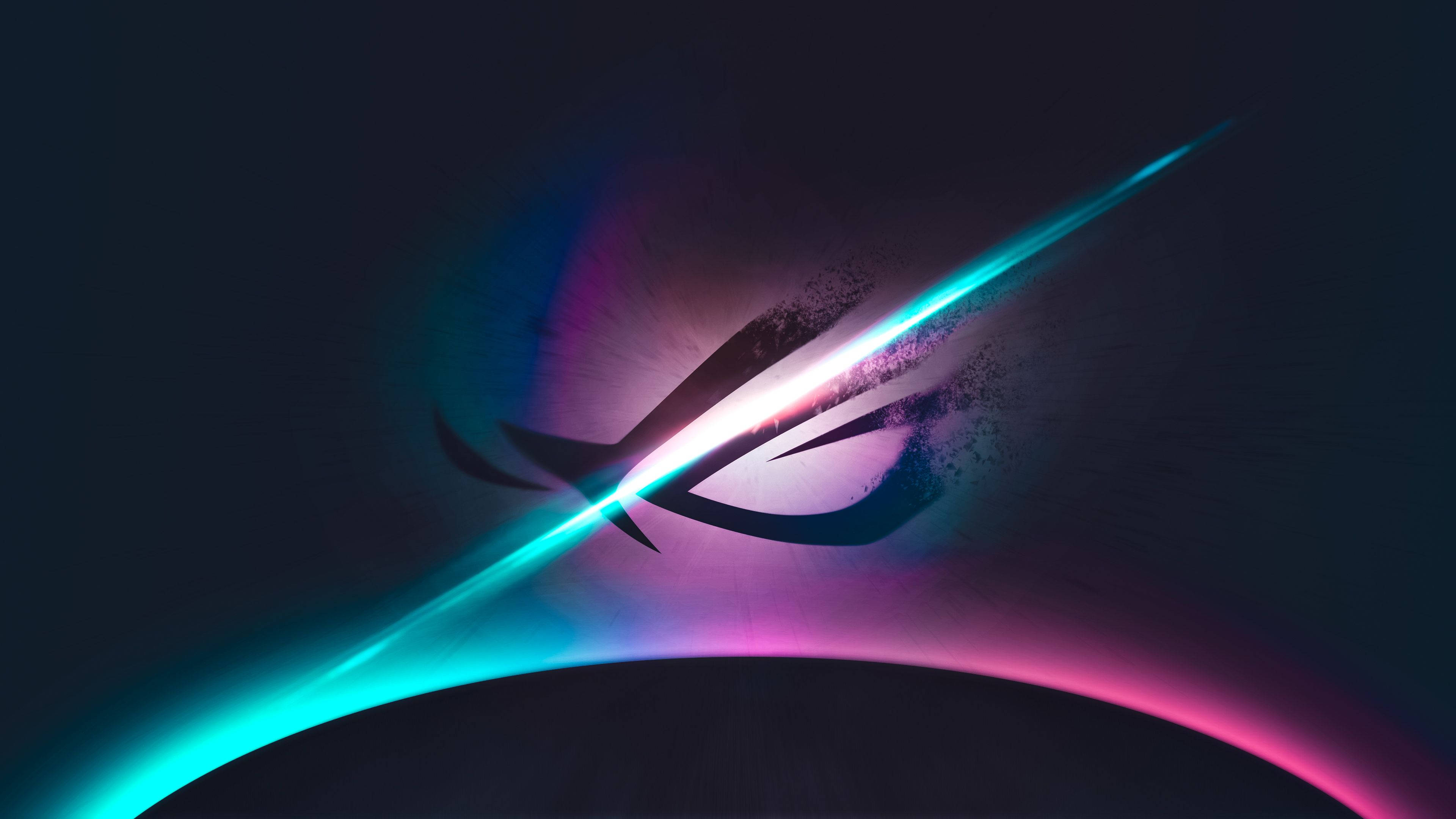 Stand Out From The Crowd With Asus ROG Wallpaper — A glowing ROG eye logo radiates electric blue and magenta light against a dark gradient background.