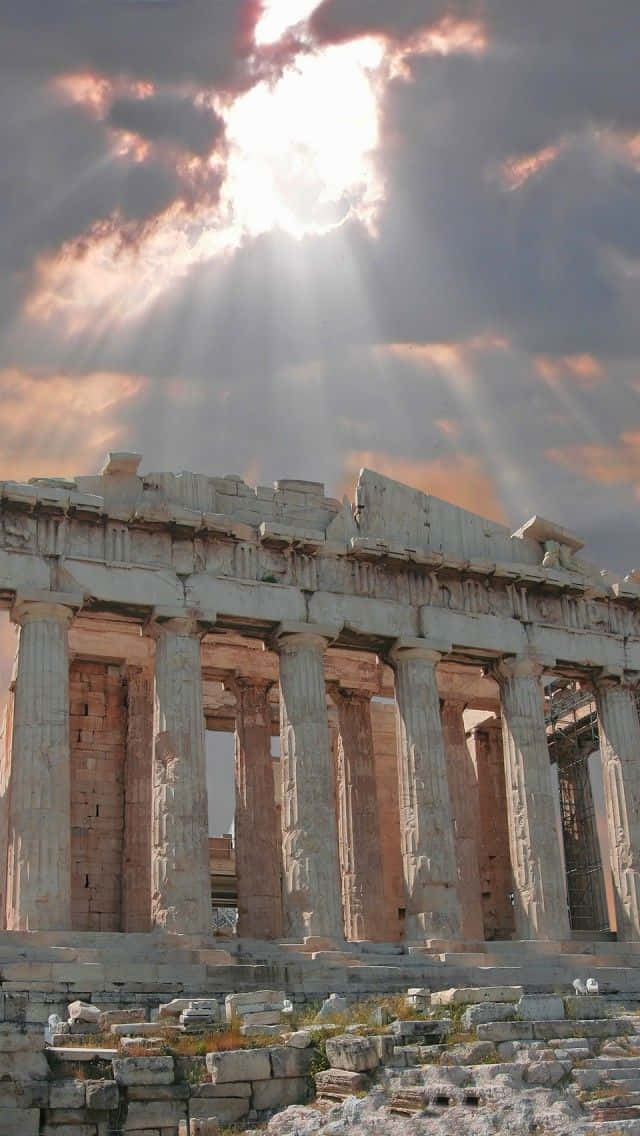 Athenian Acropolis Basking In Light Rays Wallpaper