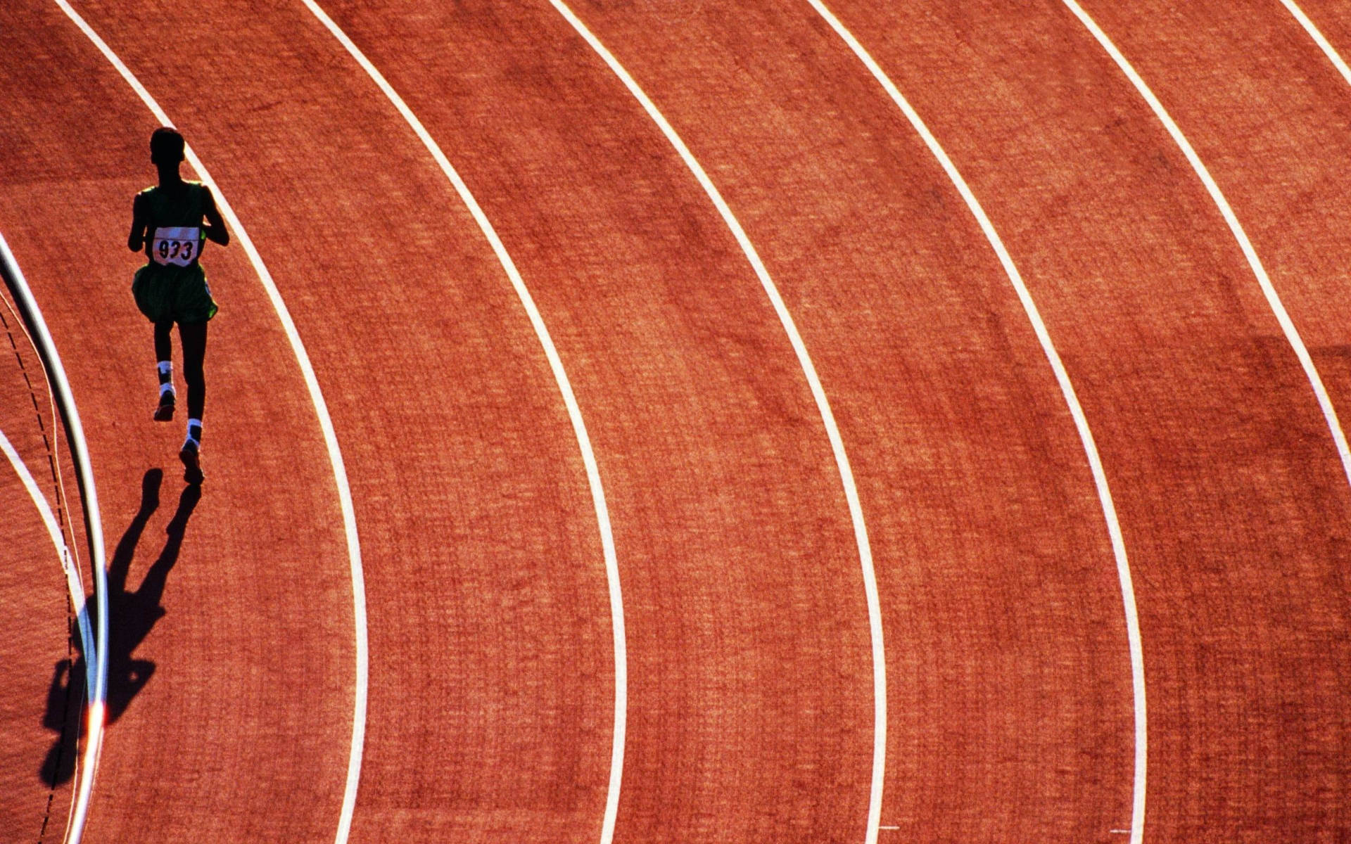 Athlete Running In Track And Field