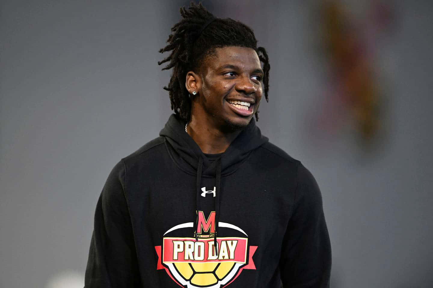Athlete Smiling Pro Day Event Wallpaper