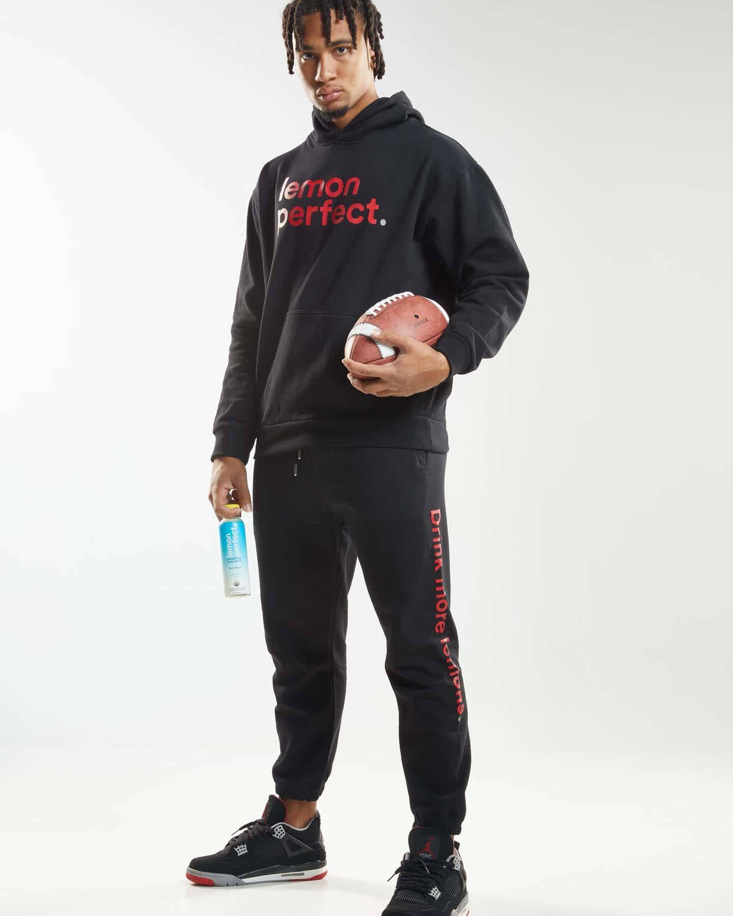 Athletein Casual Wear Holding Football Wallpaper