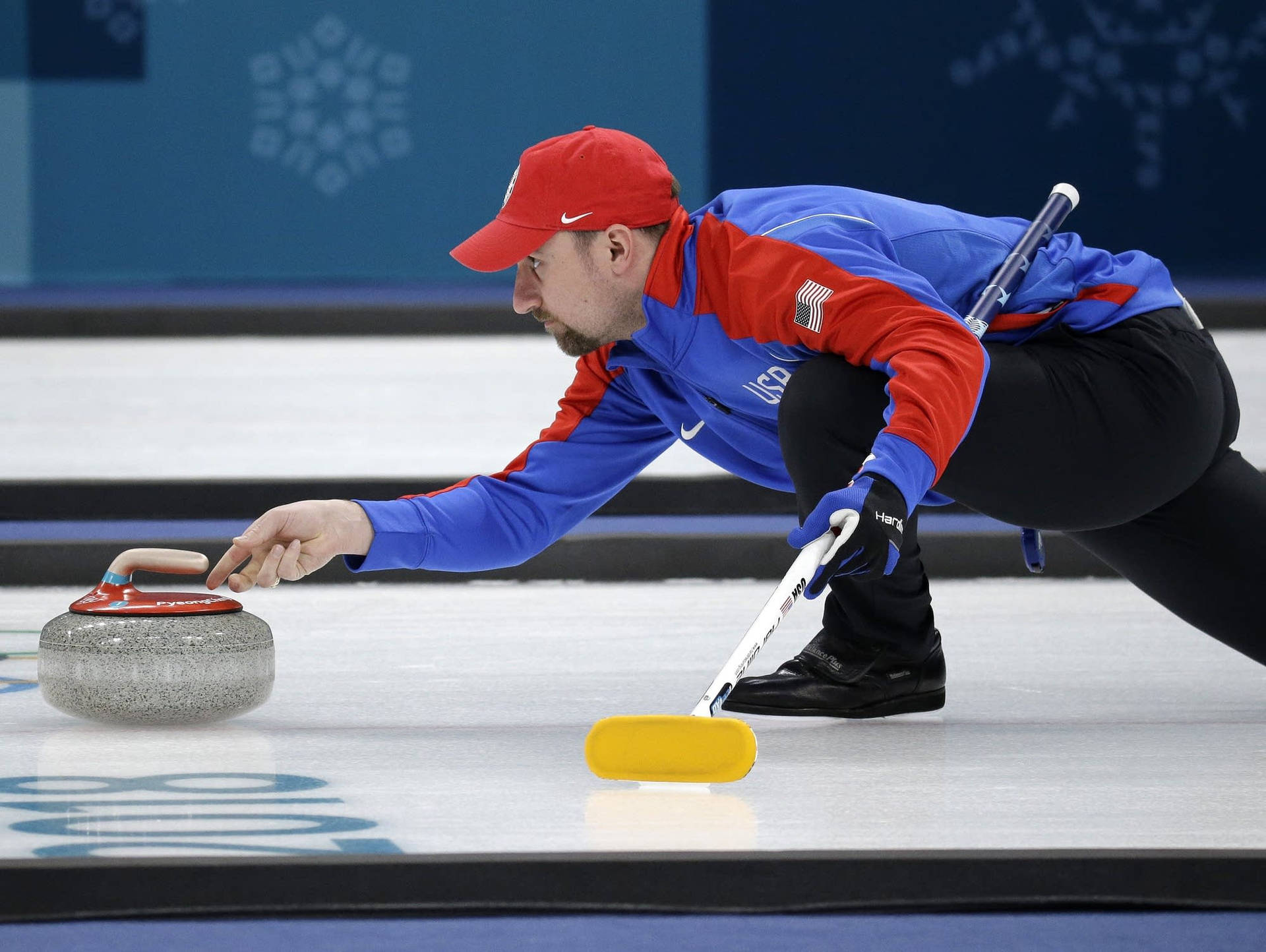 Athletes Sliding The Stones In Curling Wallpaper